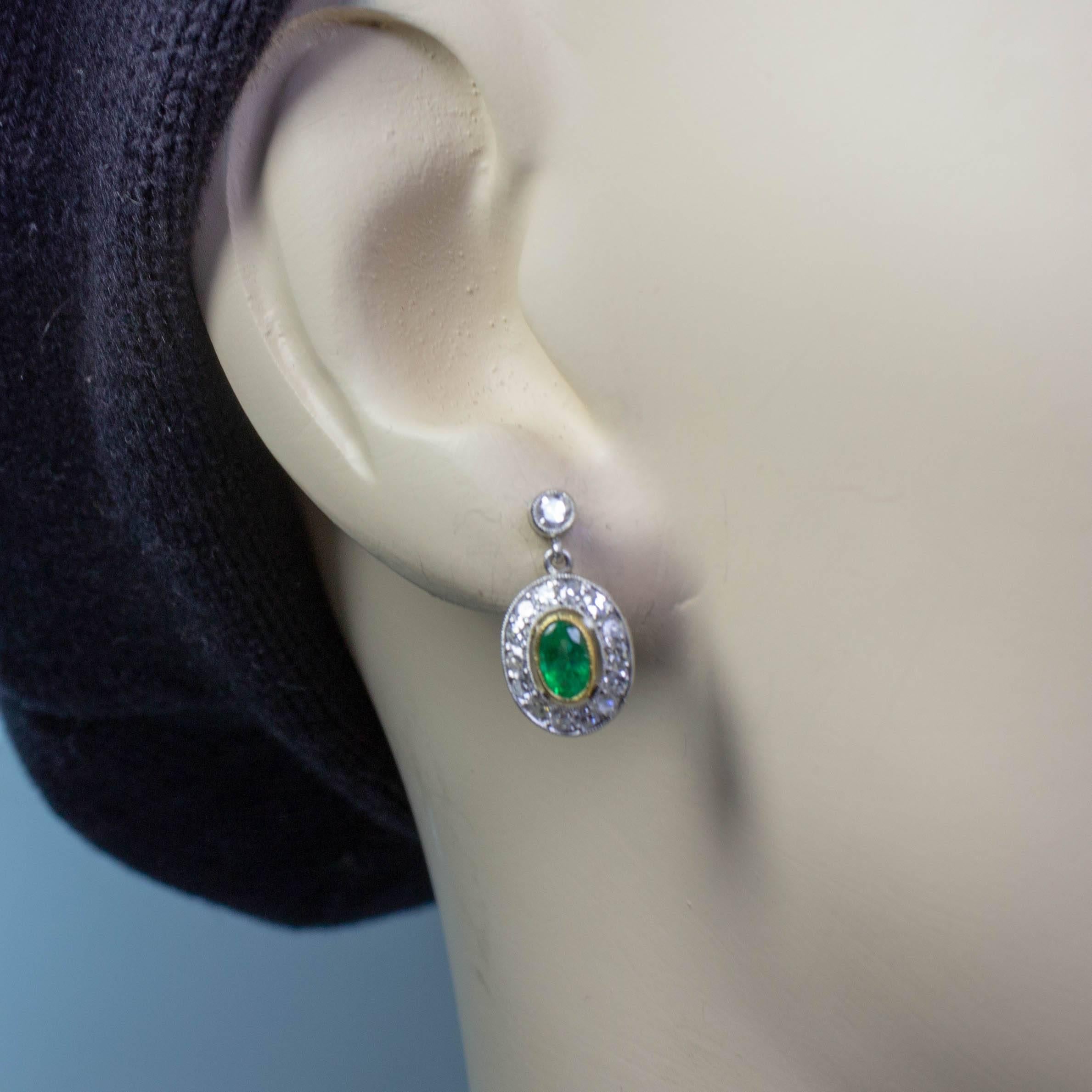 Oval Cut Estate Platinum Emeralds and Old Mine Diamond Earrings