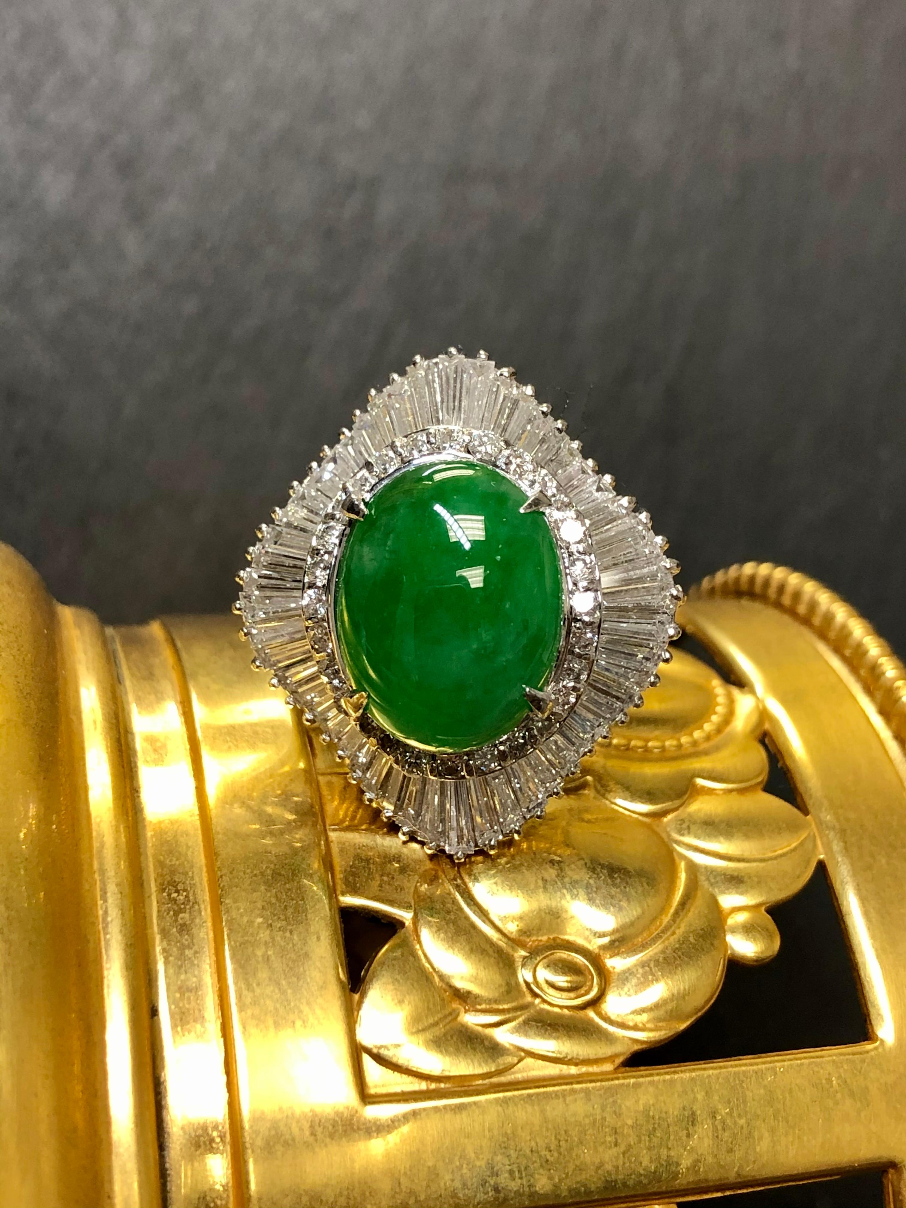 
A fabulous ballerina ring done in platinum centered by a 9.56ct cabochon “A” jade accompanied by a GIA report stating that there is no color treatment. Surrounding the center stone is approximately 4cttw I’m G-I color Vs1-2 clarity round and