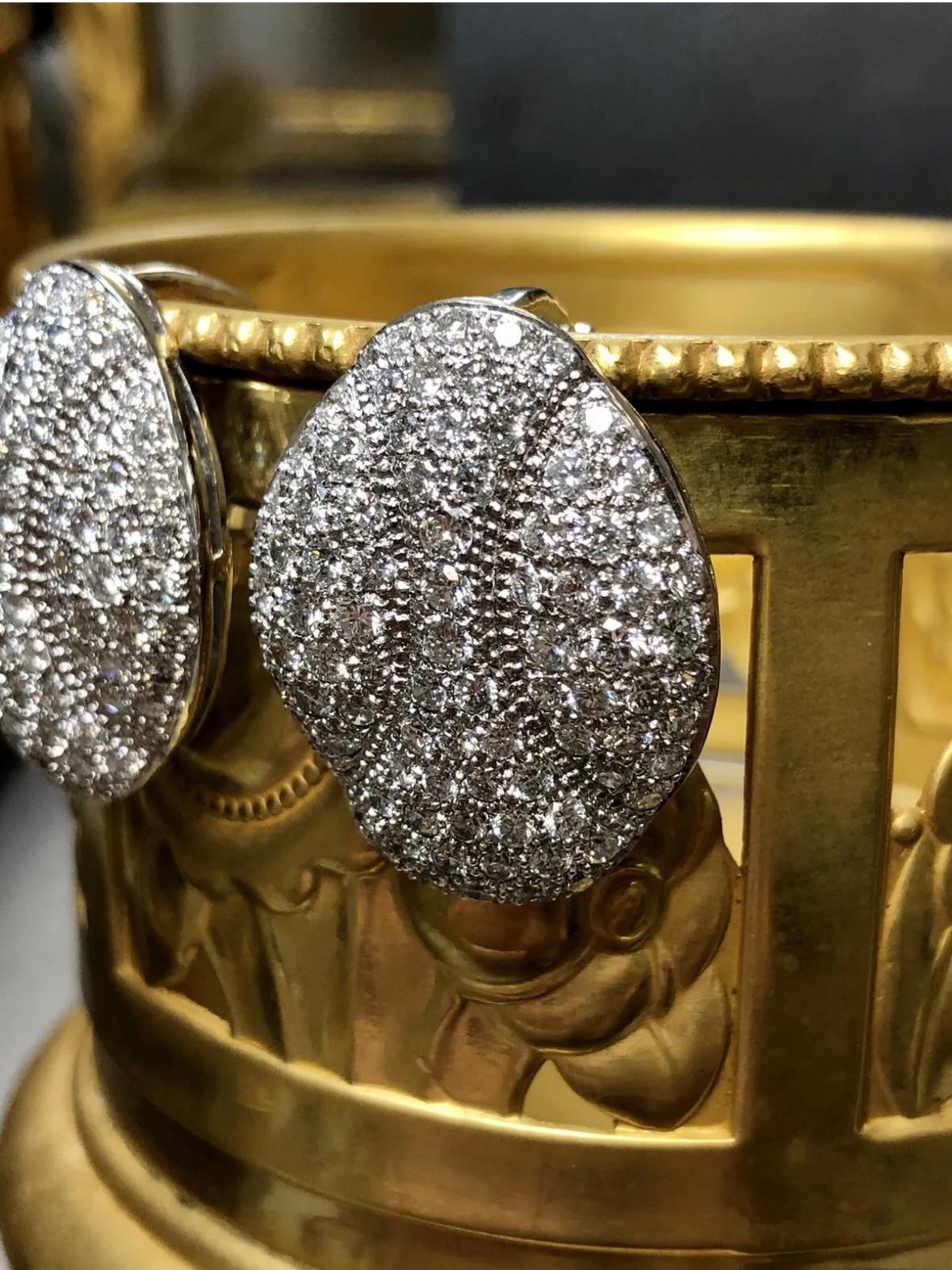 Contemporary Estate Platinum Pave Diamond Oval Huggie Omega Back Clip Earrings G Vs+ 5.50cttw For Sale