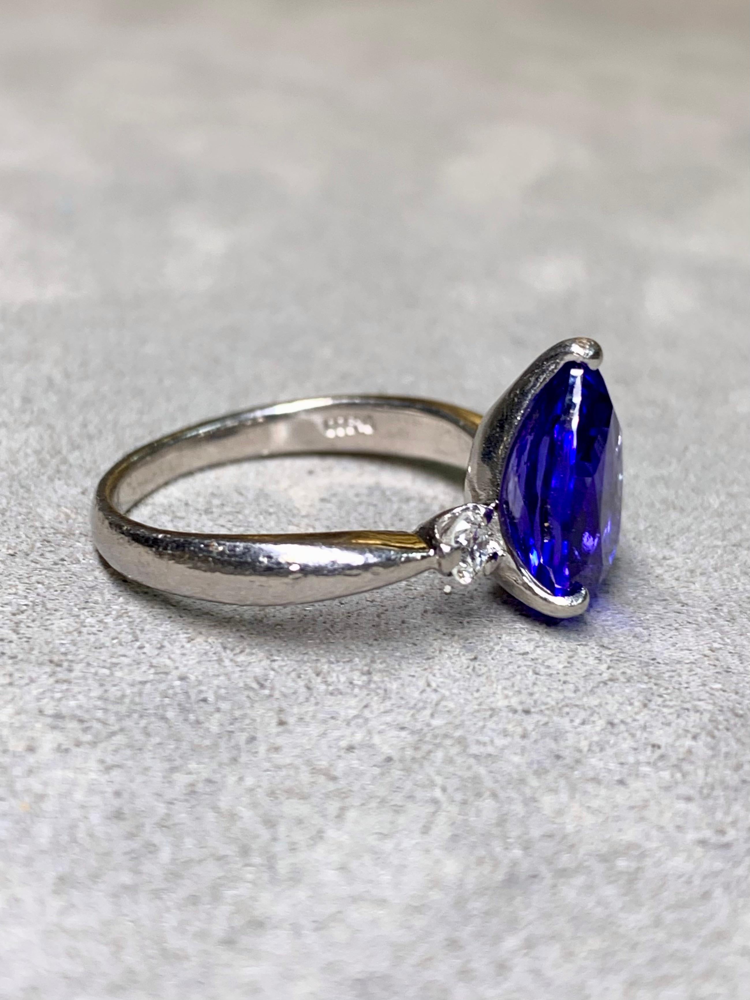 
A timeless 3-stone ring centered by a 3.55ct natural tanzanite flanked by two round full cut diamonds weighing .20ctw. The diamonds range G-I in color and Vs2-Si1 in clarity.


Dimensions/Weight:

Ring measures .47” top to bottom and weighs 7.2g.