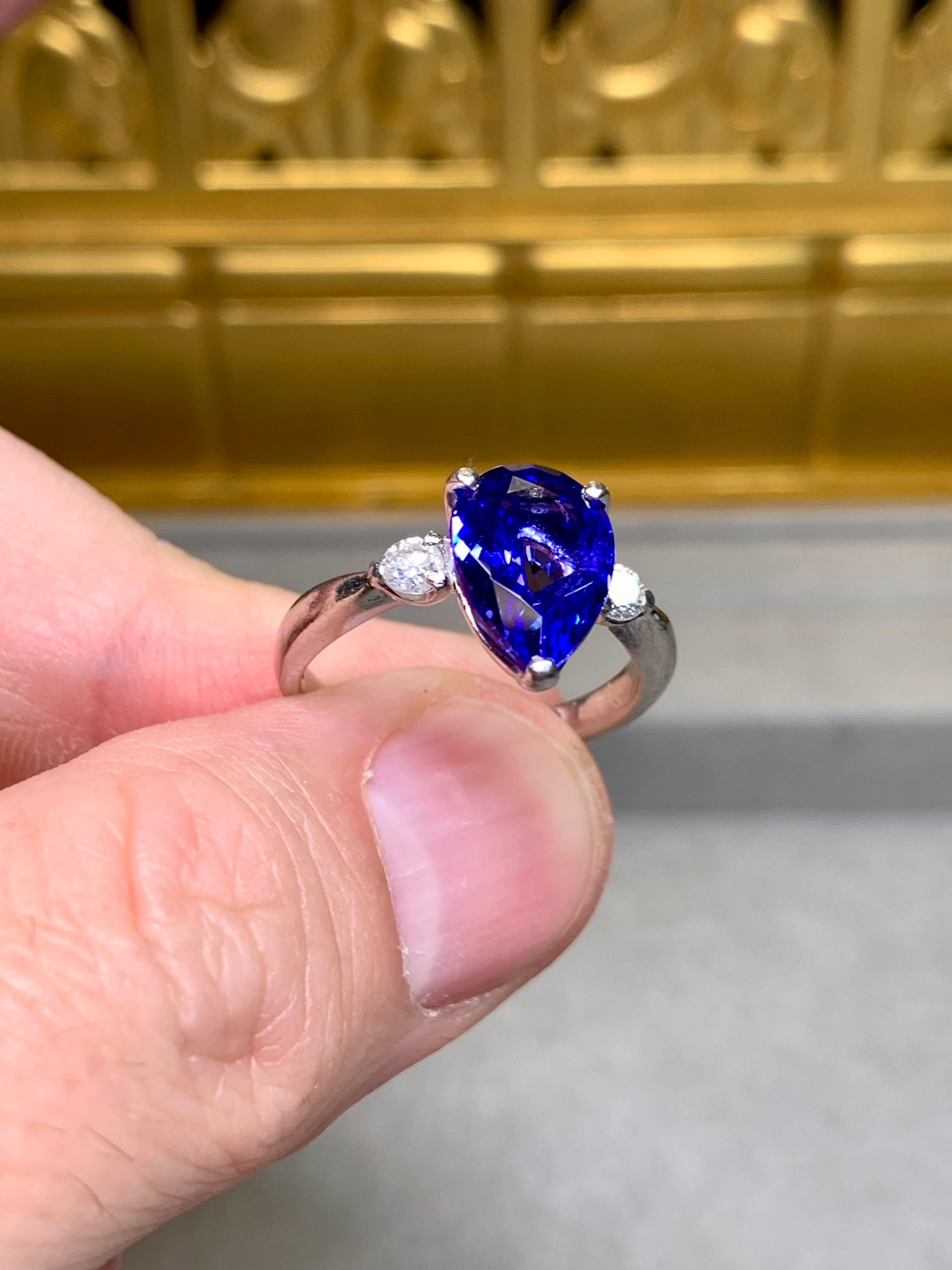 Estate Platinum Pear Tanzanite Diamond Three Stone Ring 3.75ctw Sz 7.75 In Good Condition For Sale In Winter Springs, FL