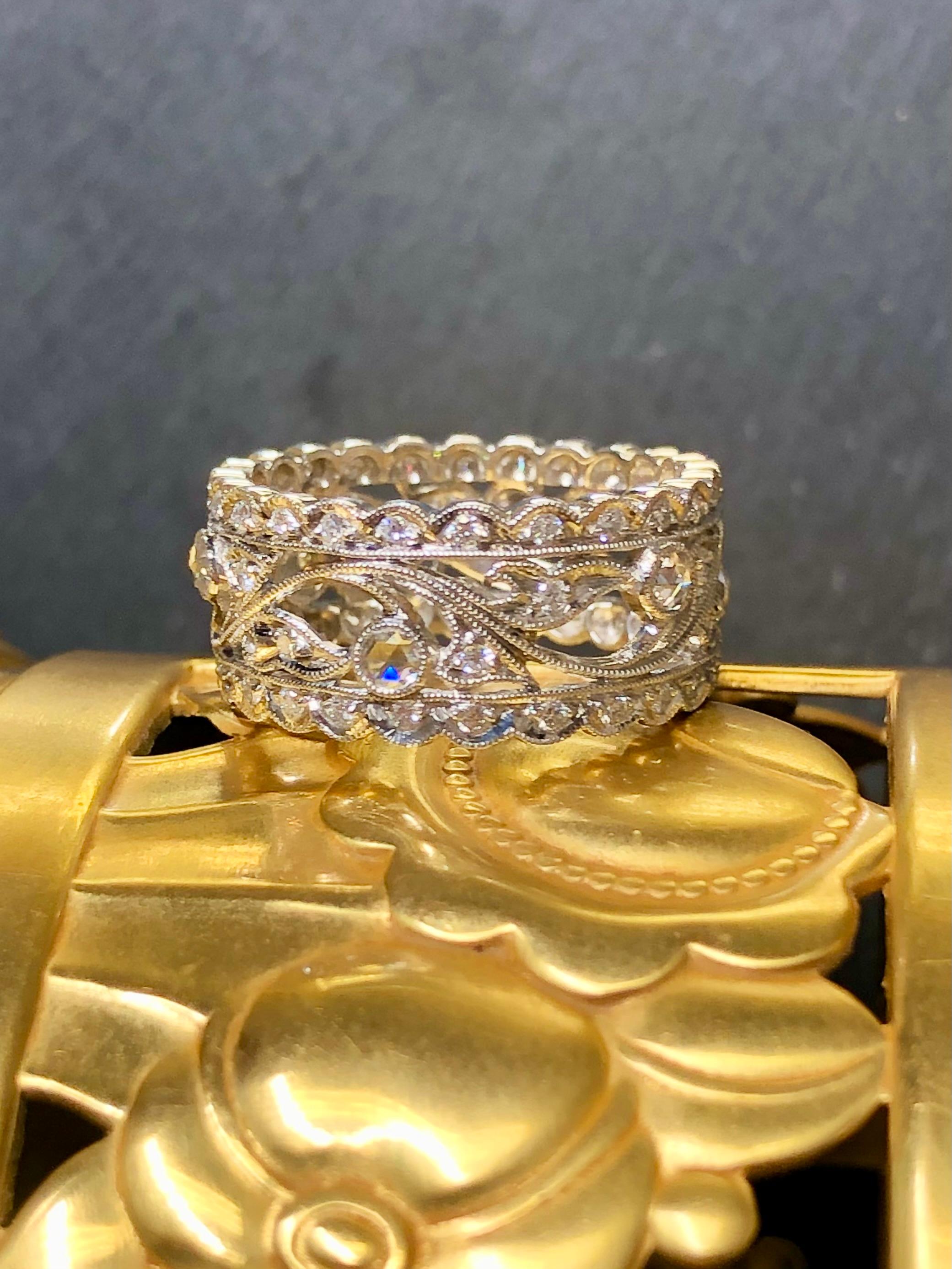 
A very well done band crafted in platinum with great attention to its milgrain detail. It has been set with both round and rose cut diamonds being G-H color and Vs1-2 clarity diamonds. Total approximate weight is .90cttw.


Dimensions/Weight:

Ring
