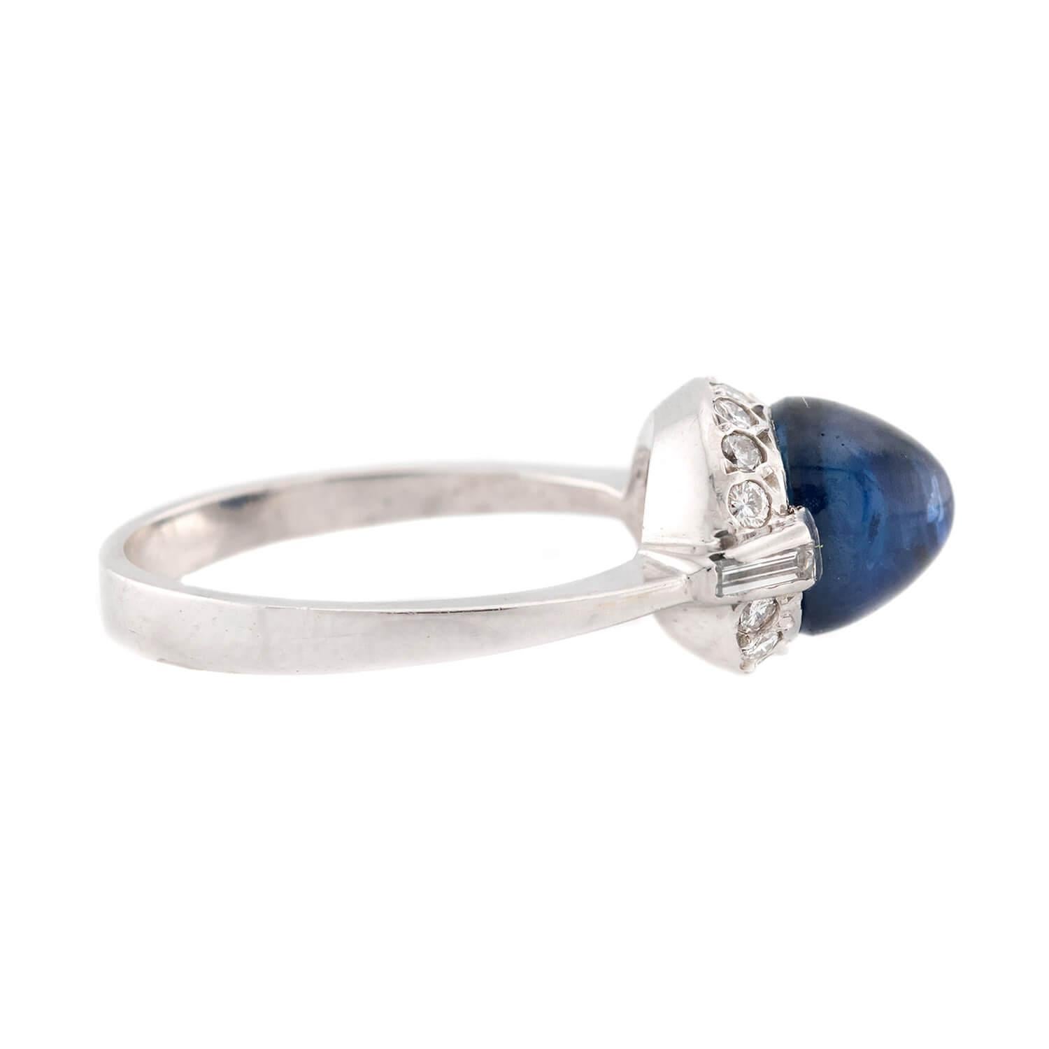 Modern Estate Platinum Sapphire and Diamond Halo Ring For Sale