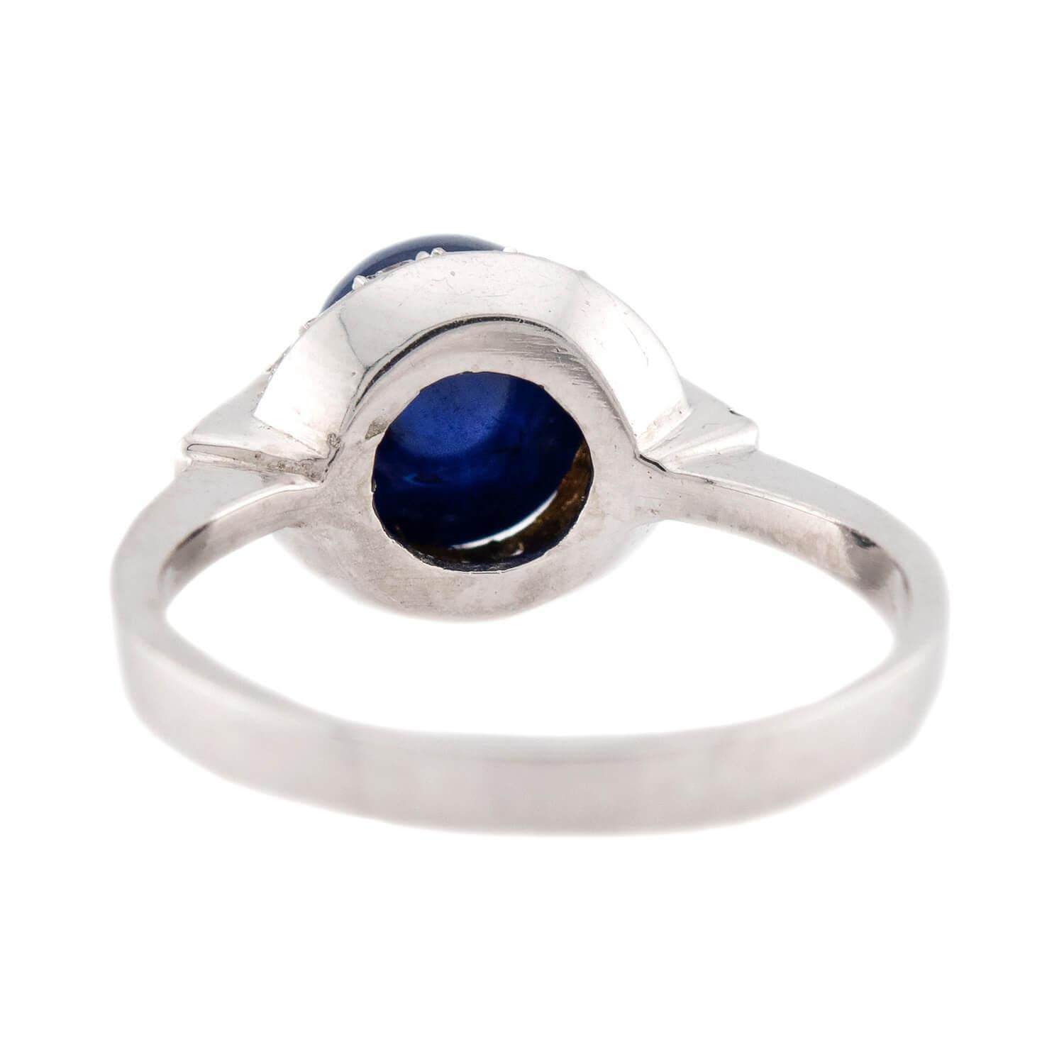 Estate Platinum Sapphire and Diamond Halo Ring In Good Condition For Sale In Narberth, PA