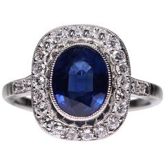 Estate Platinum Sapphires and Diamonds Ring