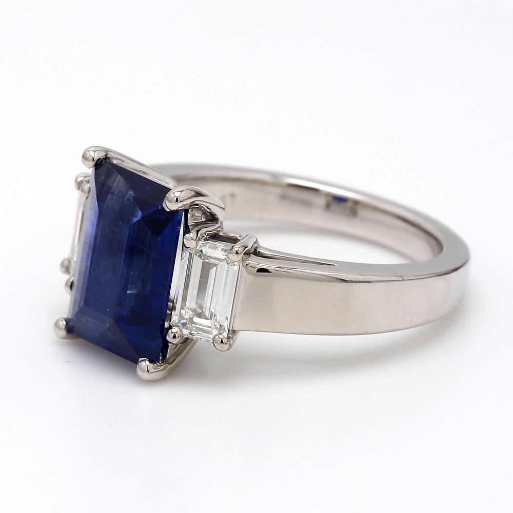 Platinum, sapphire ring. Center stone is one (1) emerald cut, sapphire weighing 3.65ct. Sapphire is flanked by two (2) emerald cut diamonds weighing 0.70ctw. Ring 11.1 grams and is a size 6.5. 
All questions answered. 
All reasonable offers are