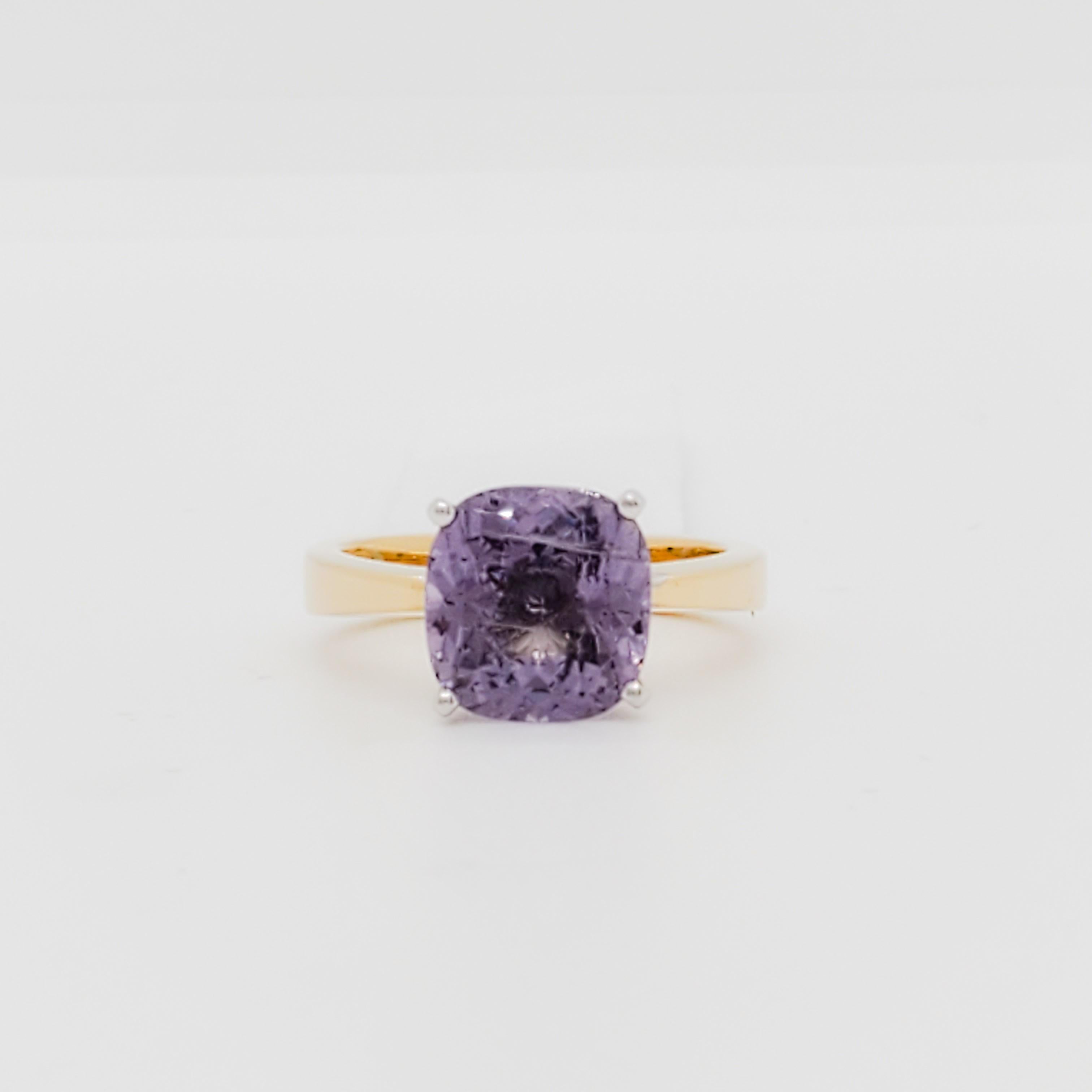 Beautiful 4.30 ct. purple spinel cushion in a handmade 14k yellow gold mounting.  Ring size 7.5.