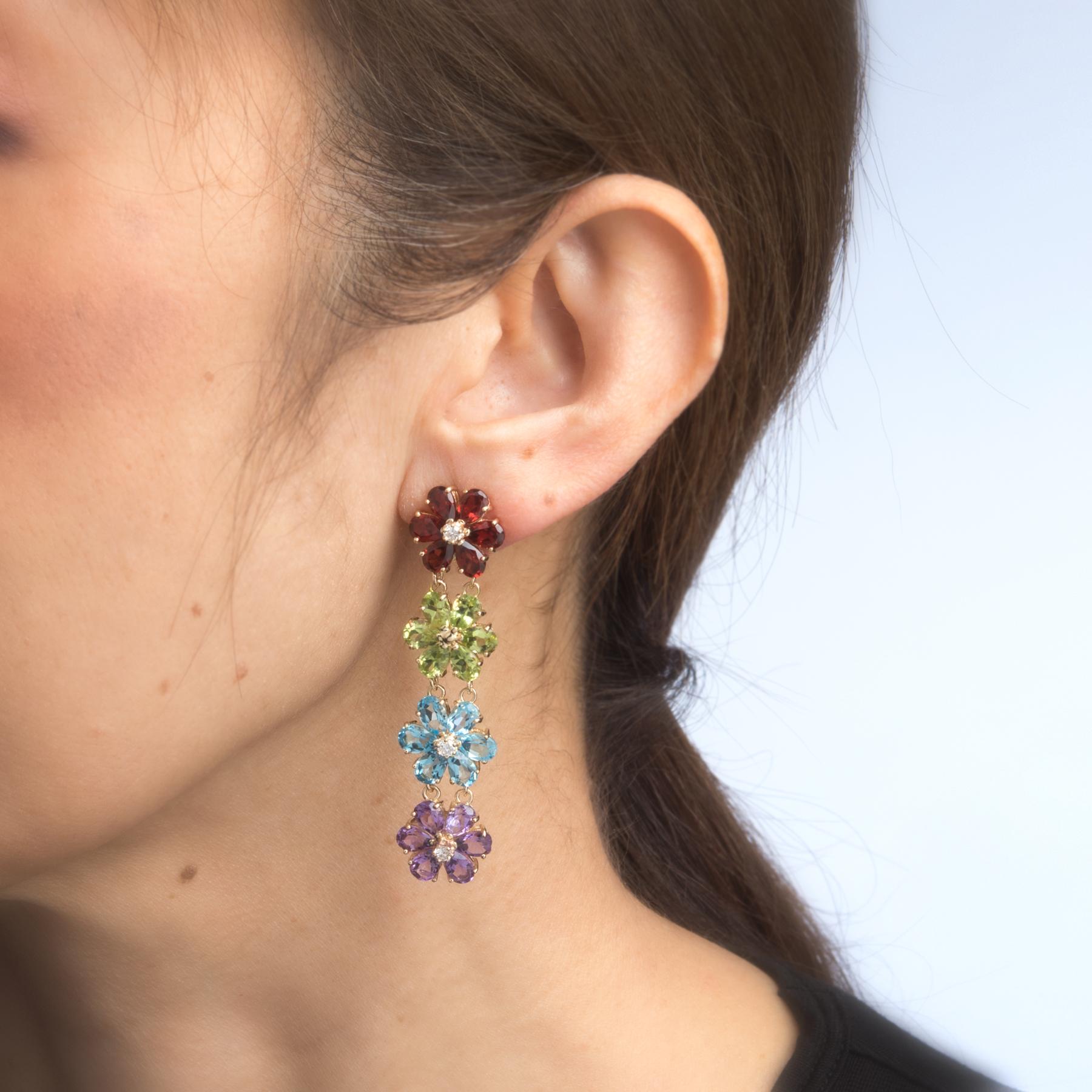Stylish pair of estate semi precious gemstone & diamond drop earrings, crafted in 14k yellow gold. 

Faceted pear cut garnet, peridot, blue topaz and amethyst each measures 5mm x 4mm (estimated at 0.25 carats each). The total weight is estimated at