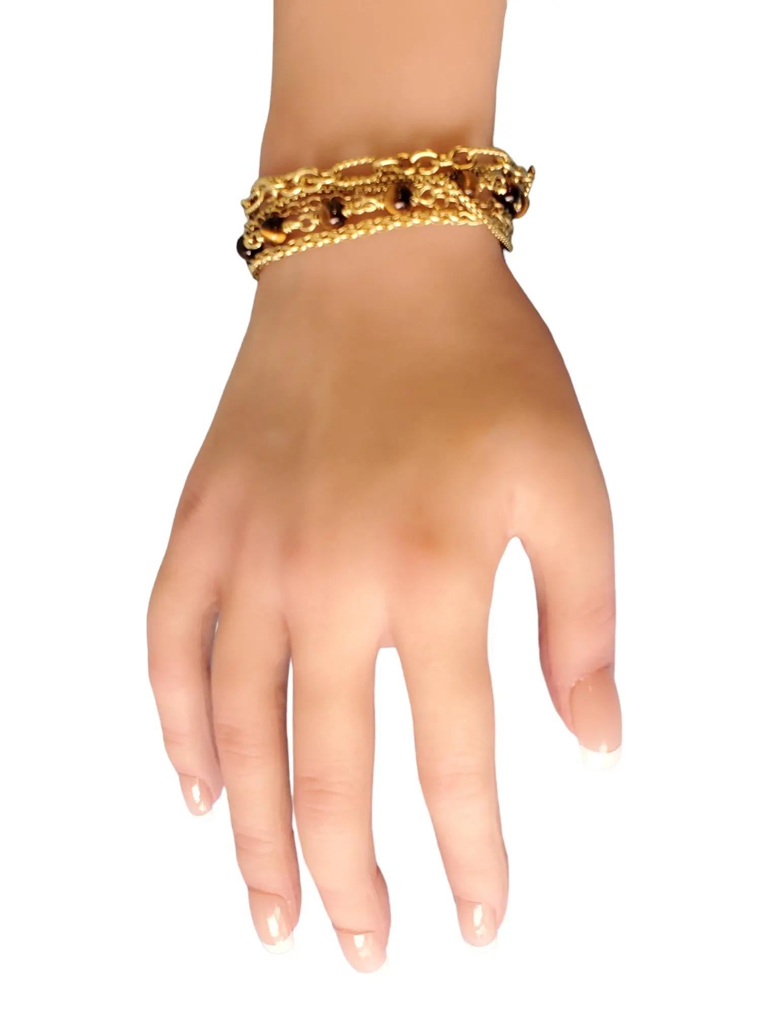 This listing is for a very unique heavy 18k multi-chain Estate David Yurman Bracelet in yellow gold with Tigers eye stones. Beautifully designed and very well made authenticated and stamped. Retail was most likely upwards of 30,000. Make it yours.