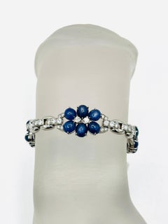 Raymond Yard, bracelet de succession en saphir bleu cabochon et diamants blancs avec boîte