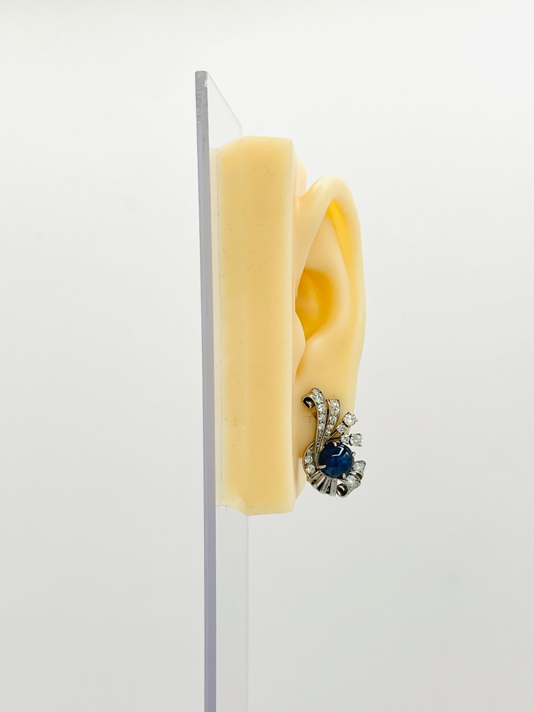 Gorgeous estate Raymond Yard blue sapphire cabochon and white diamond baguette and round earrings.  Handmade in platinum.