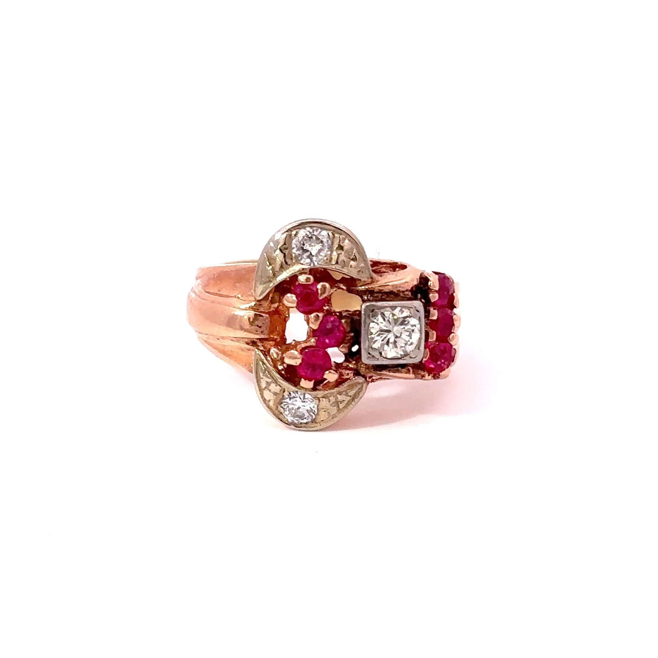 Estate 14KT Rose Gold Retro Era Ruby And Diamond Ring. Consisting of 0.30CT-TW round cut diamonds and 0.35CT-TW rubies. This timeless design showcases a lustrous contrast between the classic beauty of the rubies and the sparkle of the diamonds. It's