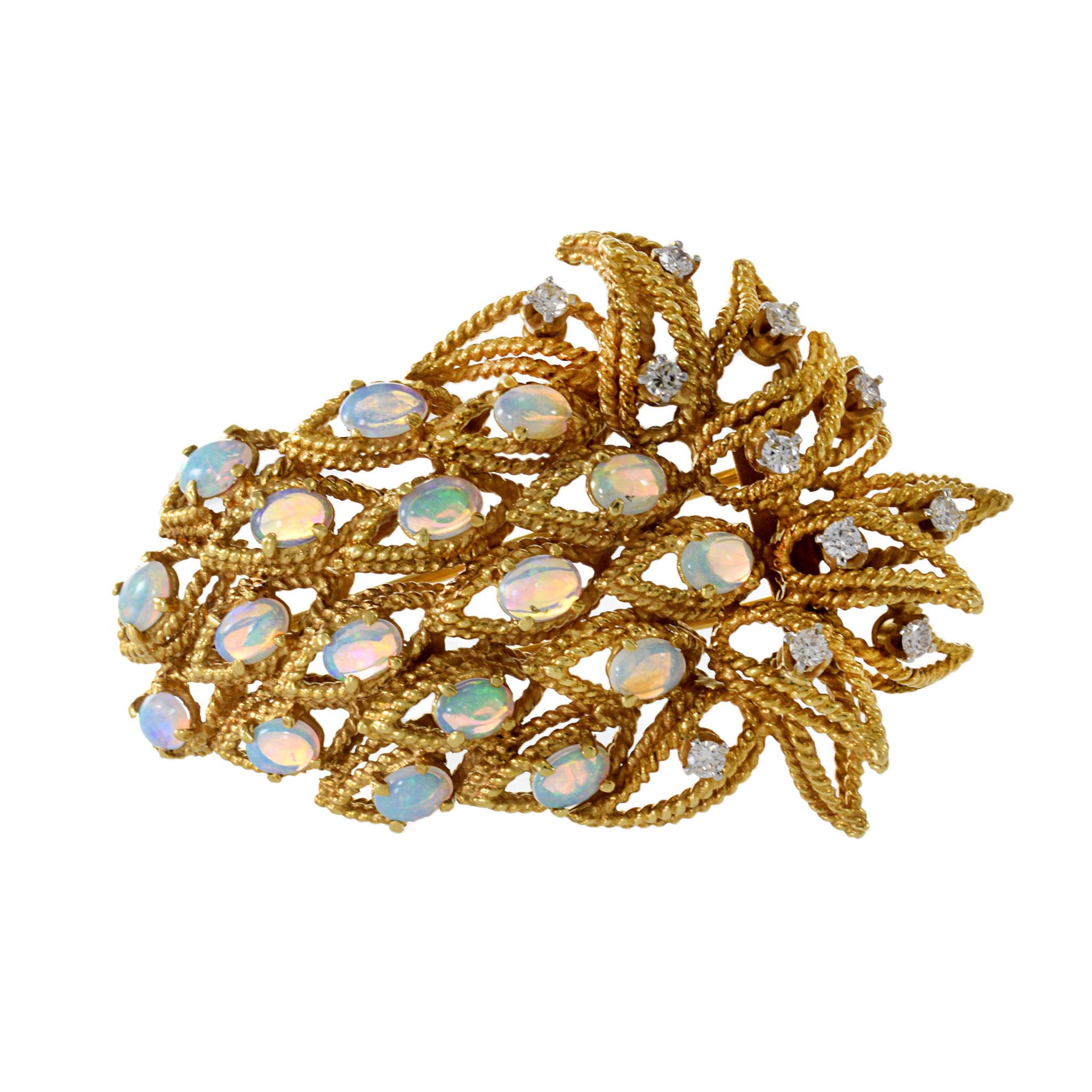 Estate Retro era 18KT Yellow Gold Rare Australian Opal And Diamond Leaf Pin, a magnificent blend of natural beauty and luxury craftsmanship. This exquisite pin showcases rare cabochon-cut Australian opals, each radiating with unique iridescence and