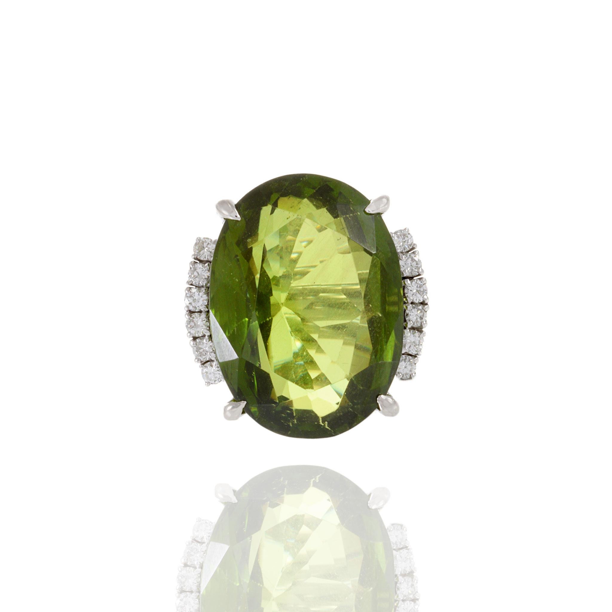 Oval Cut Estate Retro Era Platinum Peridot And Diamond Ring For Sale