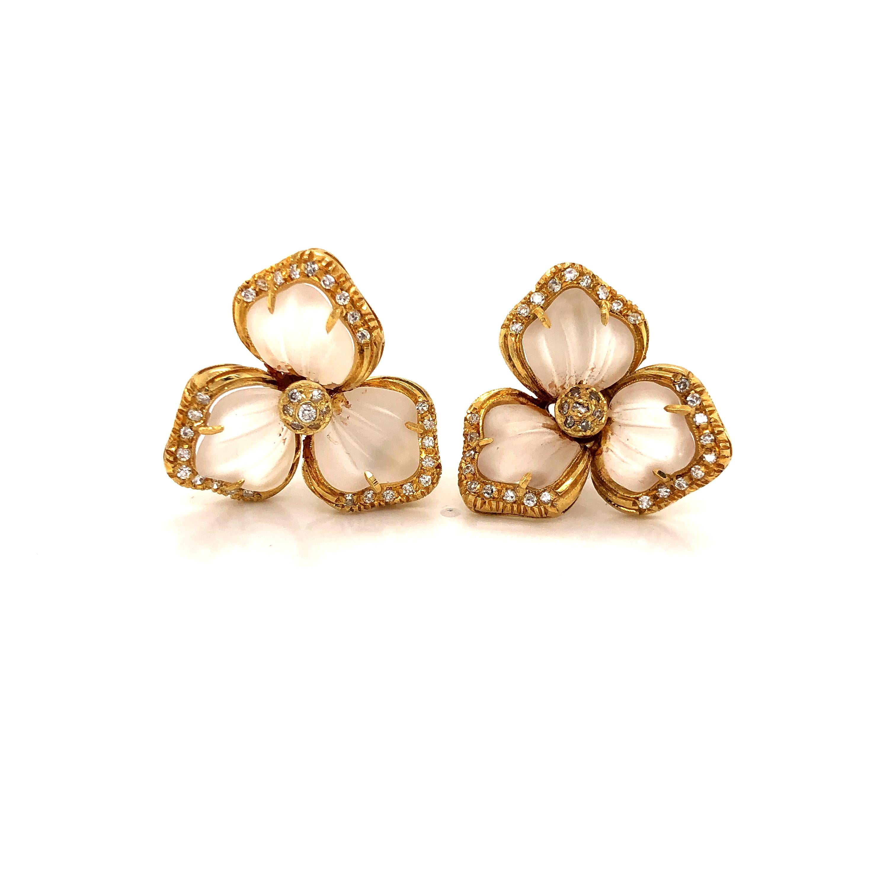Amazing Italian design way ahead of its time. This flower motif set was hand crafted by master jewelers. Etched rock crystal quartz is craved into petals with exquisite details. Prong set with step cut diamonds set throughout. The 18k yellow gold is