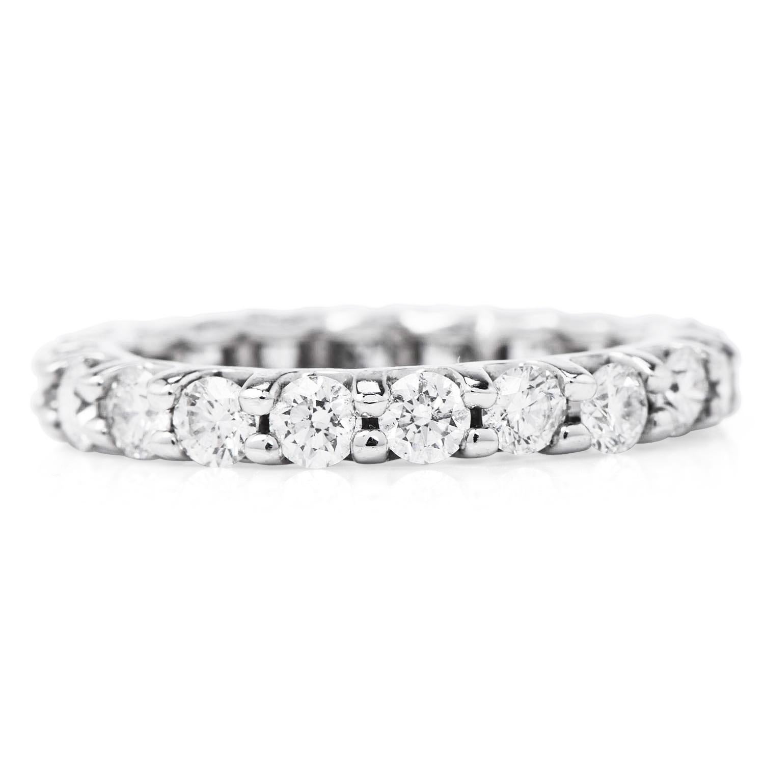 This Classic eternity band ring is the perfect piece to match your engagement ring and a perfect compliment to almost any attire.

 Experience the enchanting delight of the sparkly 20 genuine vivid diamonds,

round cut, prong set, and approximately