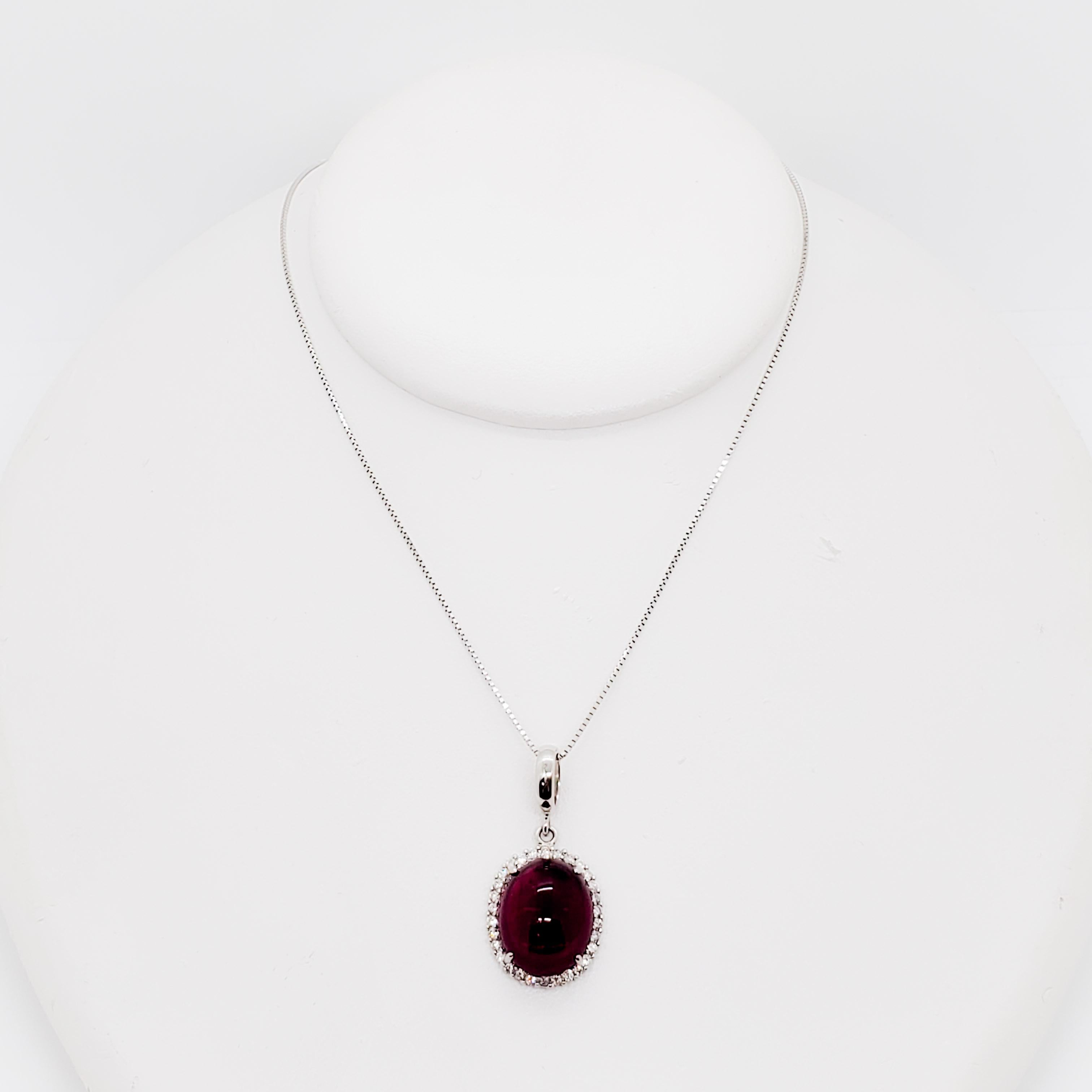 Gorgeous bright red color rubellite oval cabochon weighing 11.48 ct. with 1.35 ct. good quality, white, and bright diamond rounds.  Handmade 18k white gold mounting, length of necklace is 18