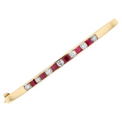 Brazalete de oro de 14k con rubíes y diamantes