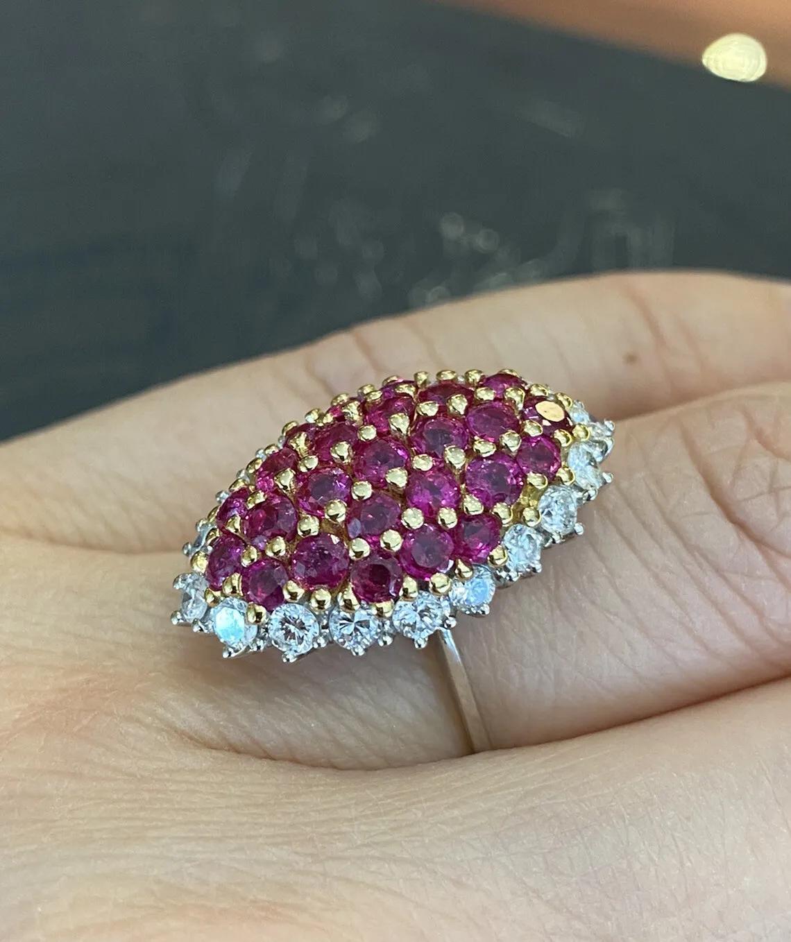 Estate Ruby and Diamond Ring in 18k White Gold and 18k Yellow Gold

Estate Ruby and Diamond Ring features 25 Round Brilliant cut Rubies surrounded by 18 Round Brilliant Diamonds, all set in 18k White Gold and 18k Yellow Gold.

Total ruby weight is
