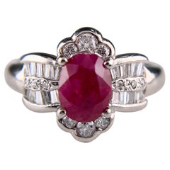 Anello con rubino e diamanti in platino