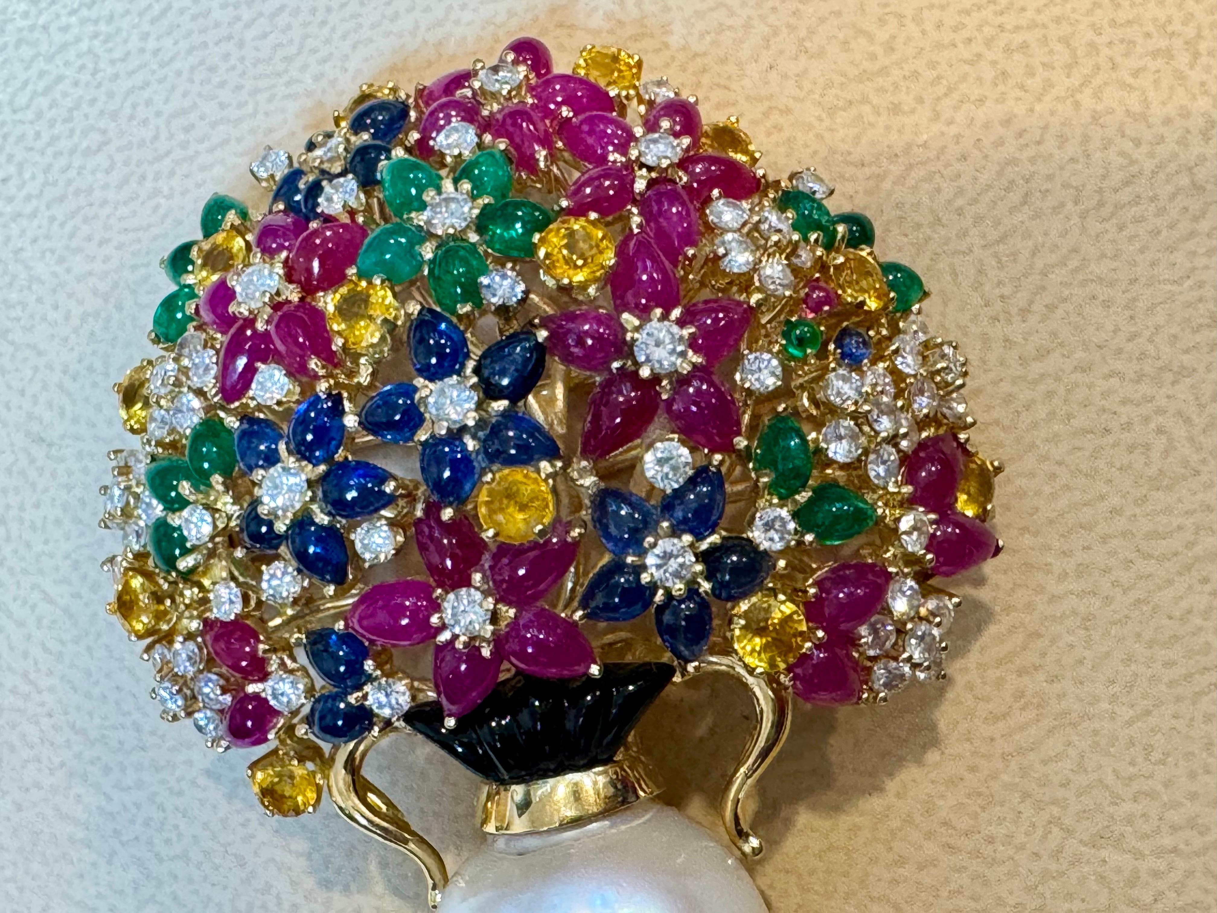 Estate Ruby Sapphire Emerald Diamond & Pearl 18 K Gold Flower Basket Brooch/ pin
18k Yellow gold flower basket brooch, adorned with vivid sapphires Emeralds  and rubies, as well as 2.95 ctw in diamonds. Brooch measures 2.5