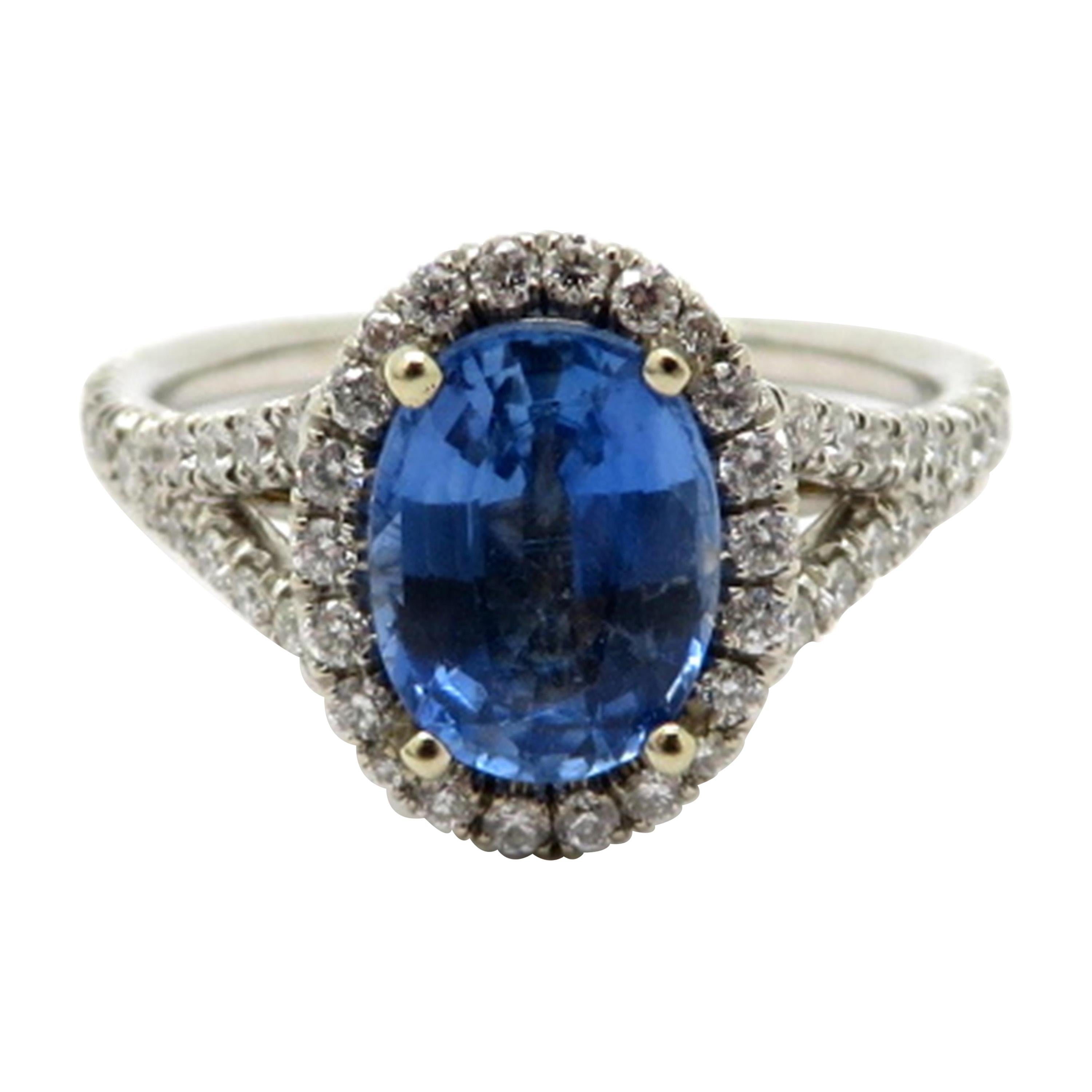 Estate Sapphire and Diamond 18 Karat White Gold Halo Ring For Sale