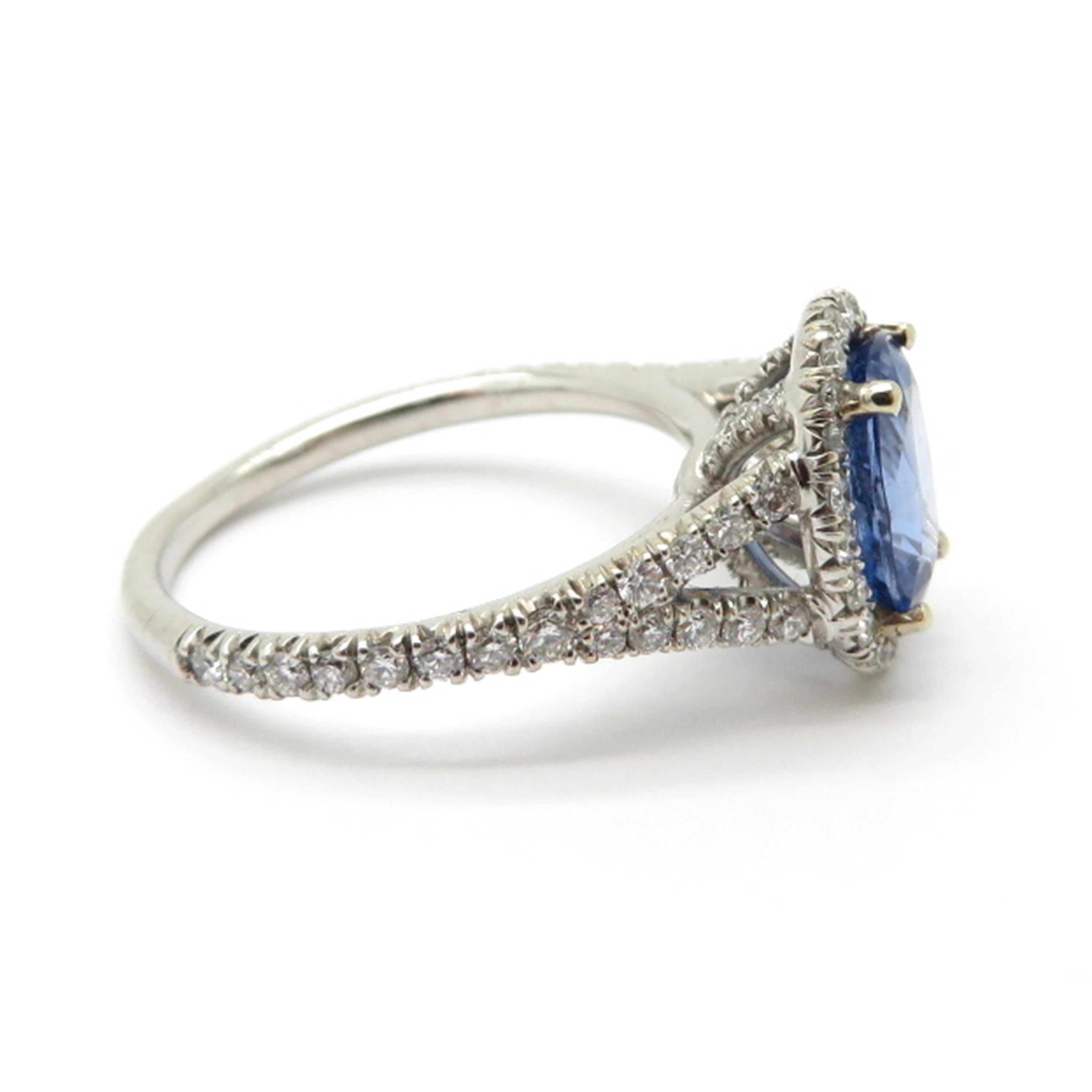Estate Sapphire and Diamond 18 Karat White Gold Halo Ring In Excellent Condition For Sale In Scottsdale, AZ