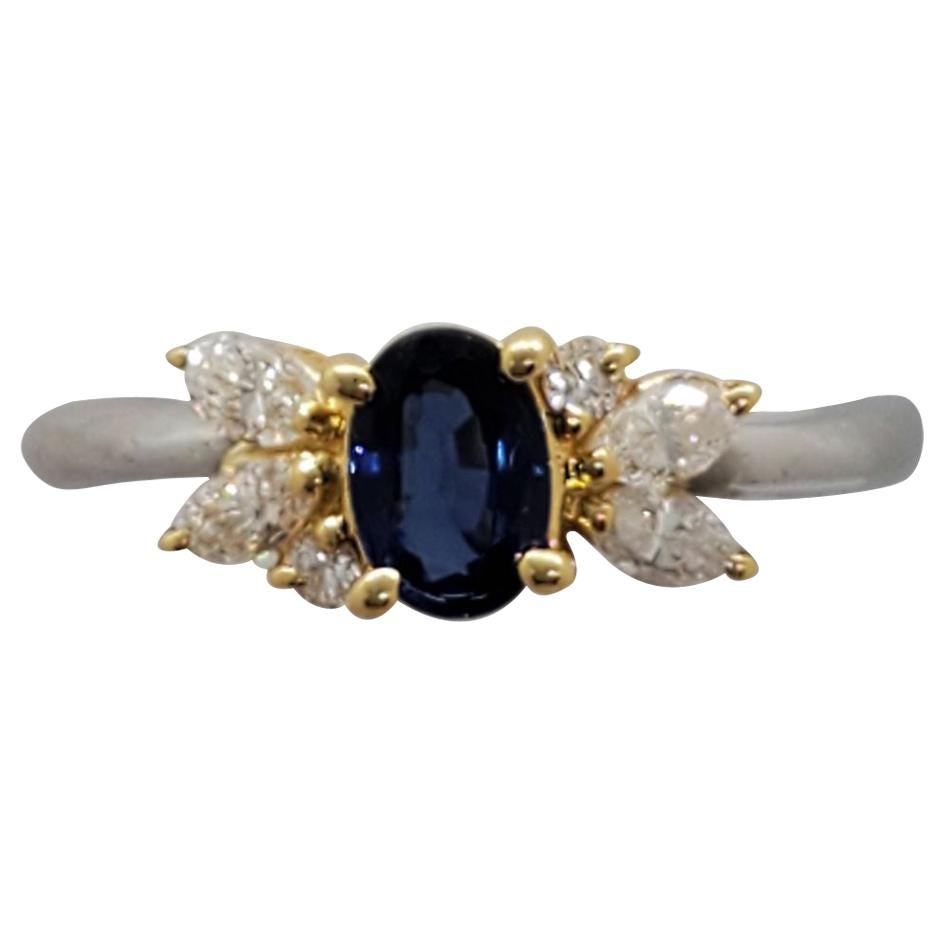 Sapphire Oval and Diamond Ring in Platinum and 18 Karat Gold For Sale