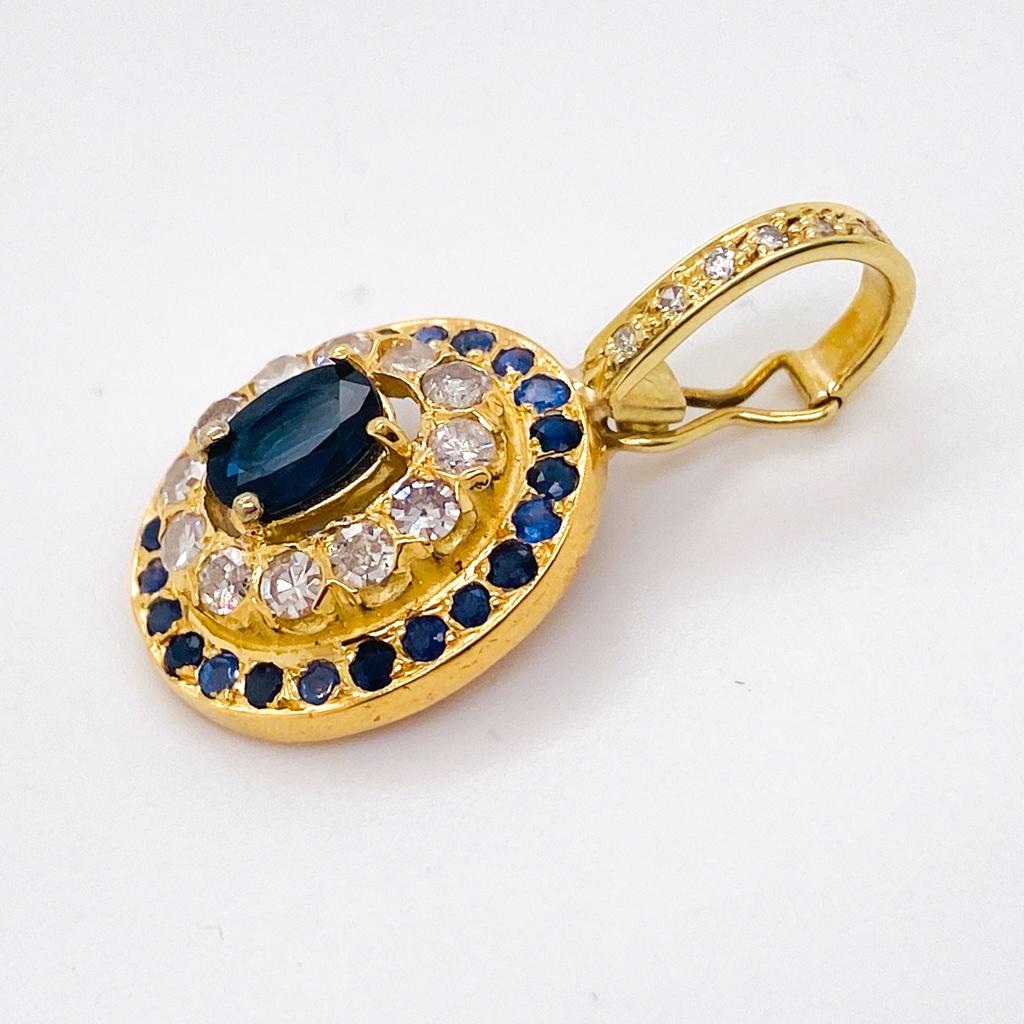 This beautiful sapphire and diamond enhancer pendant adds an elegance to anything you put it on. Wear this on pearls, a heavy gold chain, a wide omega necklace, beads, etc. You'll love the way your look changes with just the addition of this beauty!