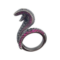 Estate Serpent Design Ring with Black Diamonds, Rubies, and Blue Sapphires