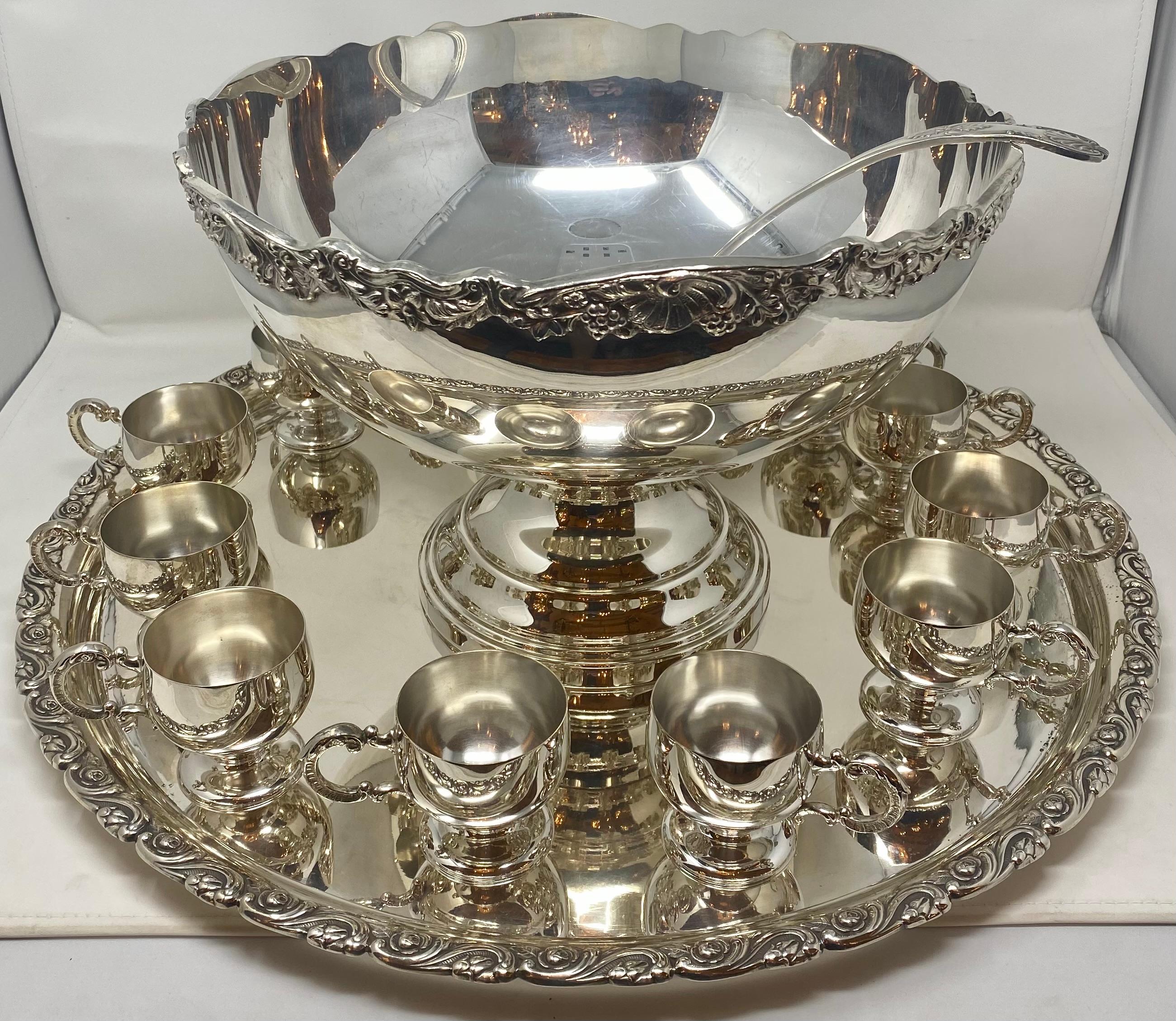 Estate silver-plated 15 piece punch bowl service with cups, tray and ladle. Wonderful for entertaining.
Overall: 10-1/2