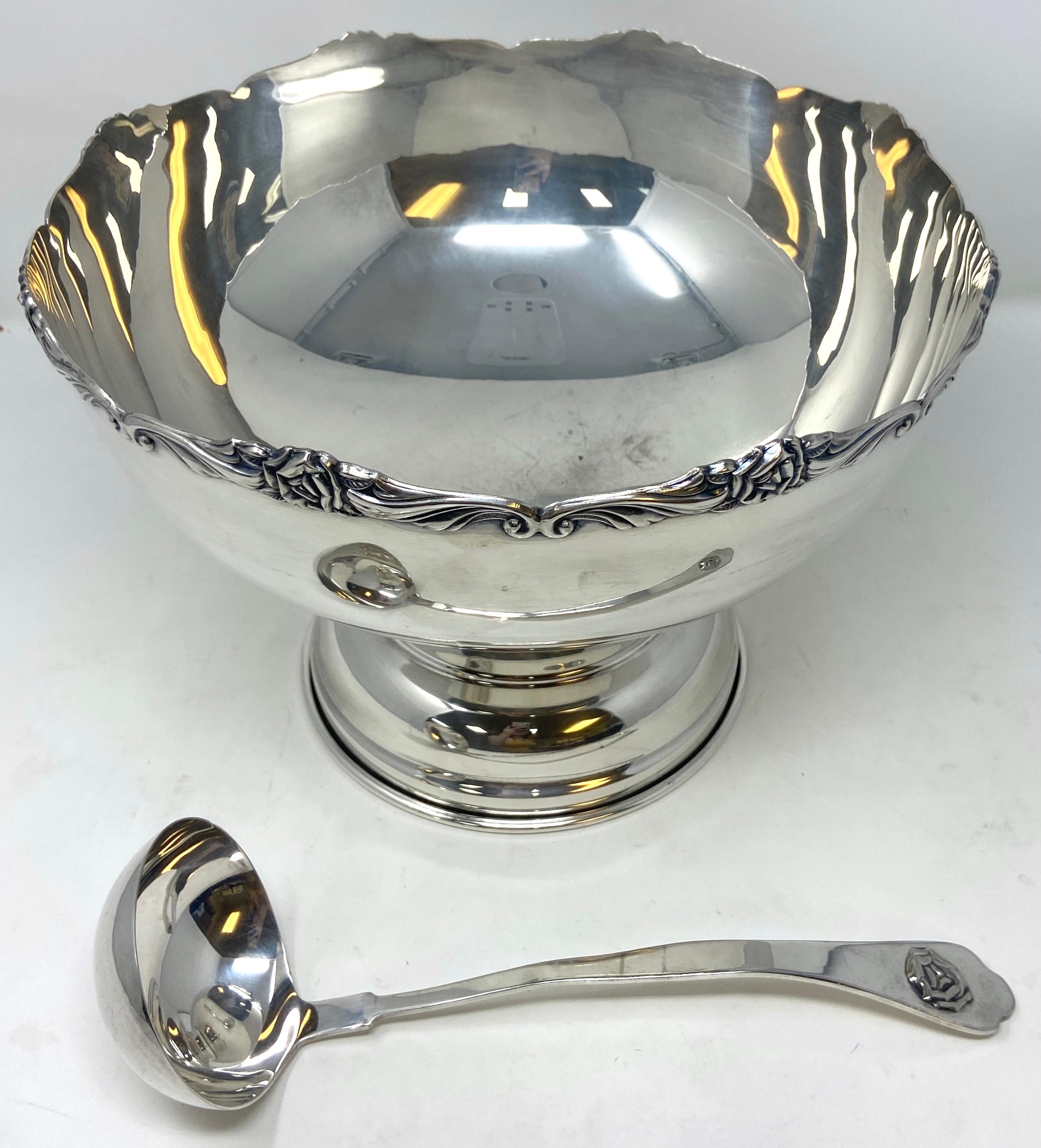 silver punch bowl with cups