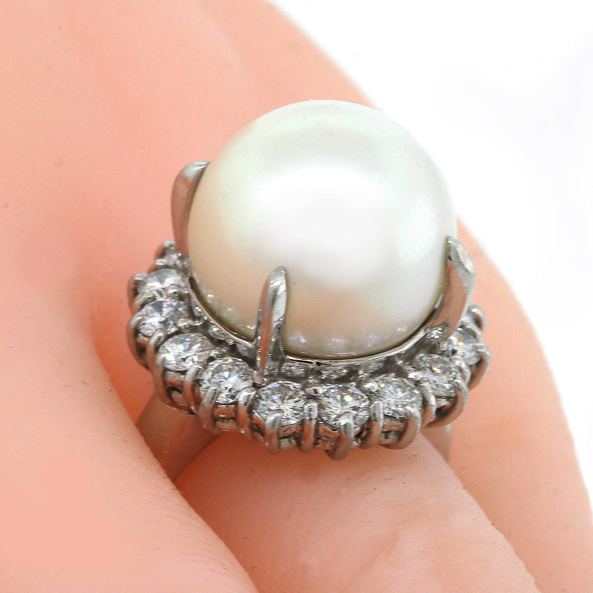 Platinum
Diamond: 1.36 ct twd
South Sea Pearl: 14 mm
Ring Size: 5.75
Total Weight: 18.6 grams