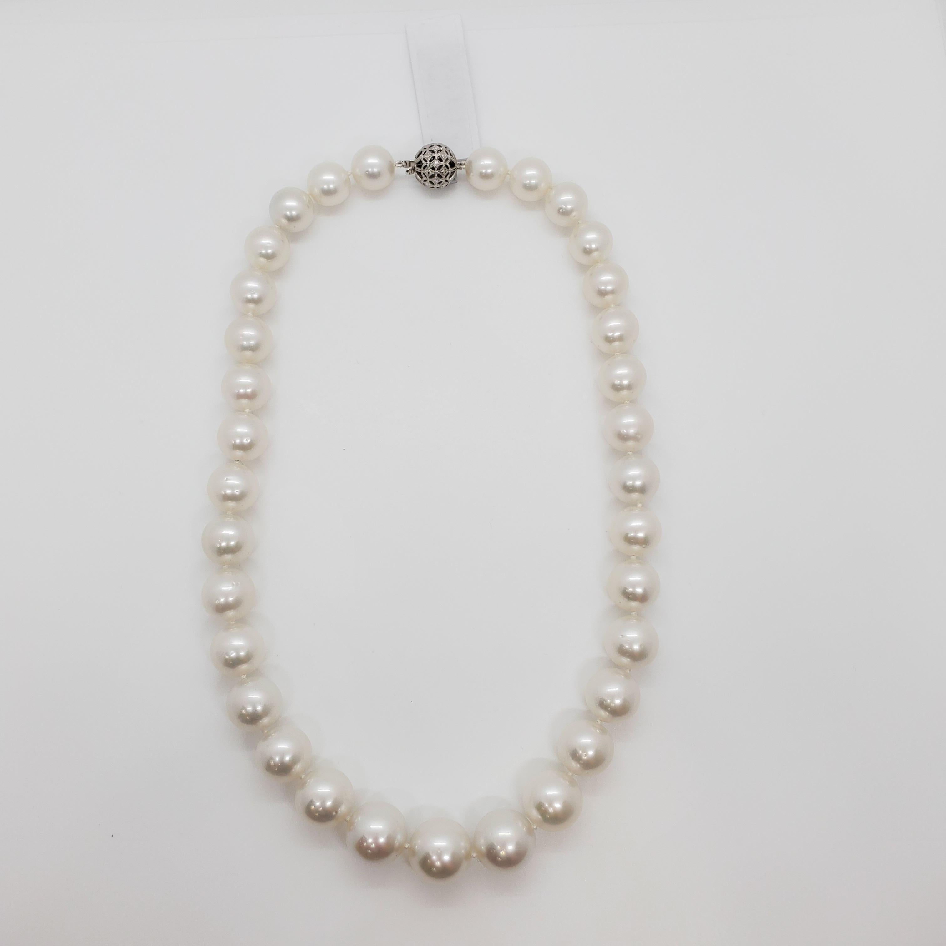 Gorgeous white round South Sea pearls with very little blemishes and a beautiful luster.  Total 33 pearls, 12- 15.55 mm in size, 18.75