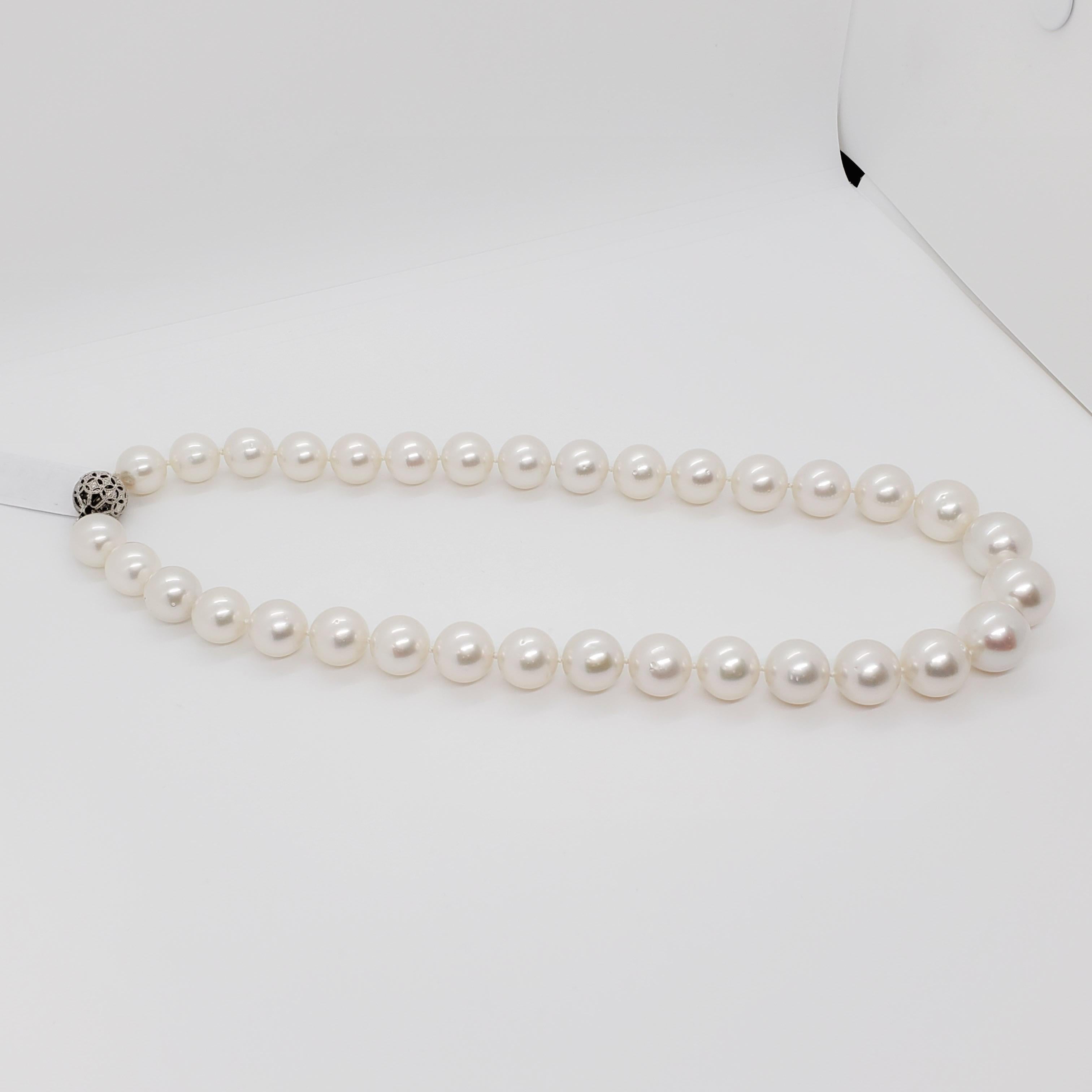 Estate South Sea White Round Pearl Strand with Diamond Clasp In Excellent Condition In Los Angeles, CA
