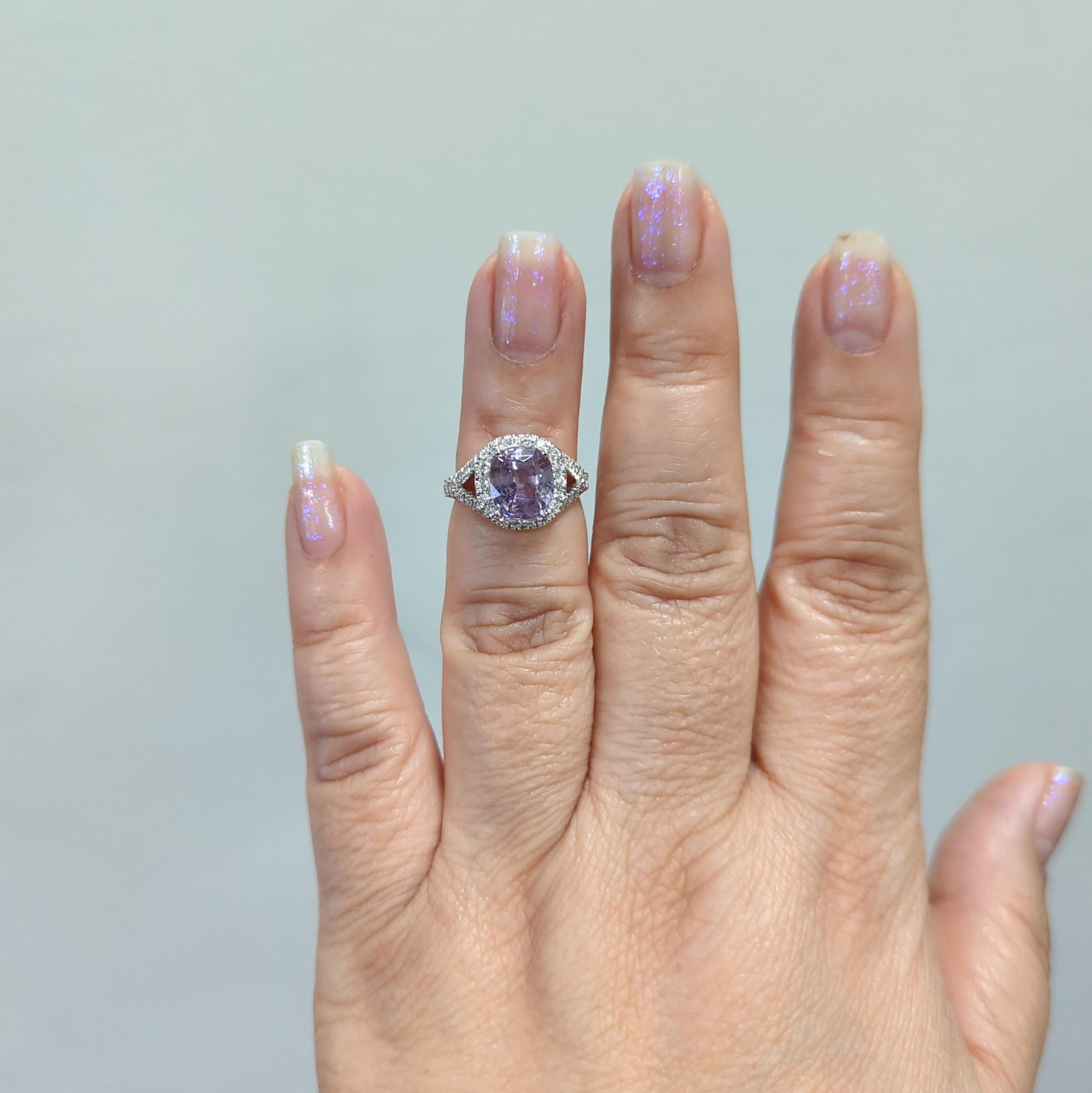 Beautiful lavender 3.53 ct. spinel cushion with 0.84 ct. good quality white diamond rounds.  Handmade in platinum.  Ring size 4.25.