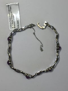 Estate Star Ruby Oval Cabochon and White Diamond Bracelet in Platinum