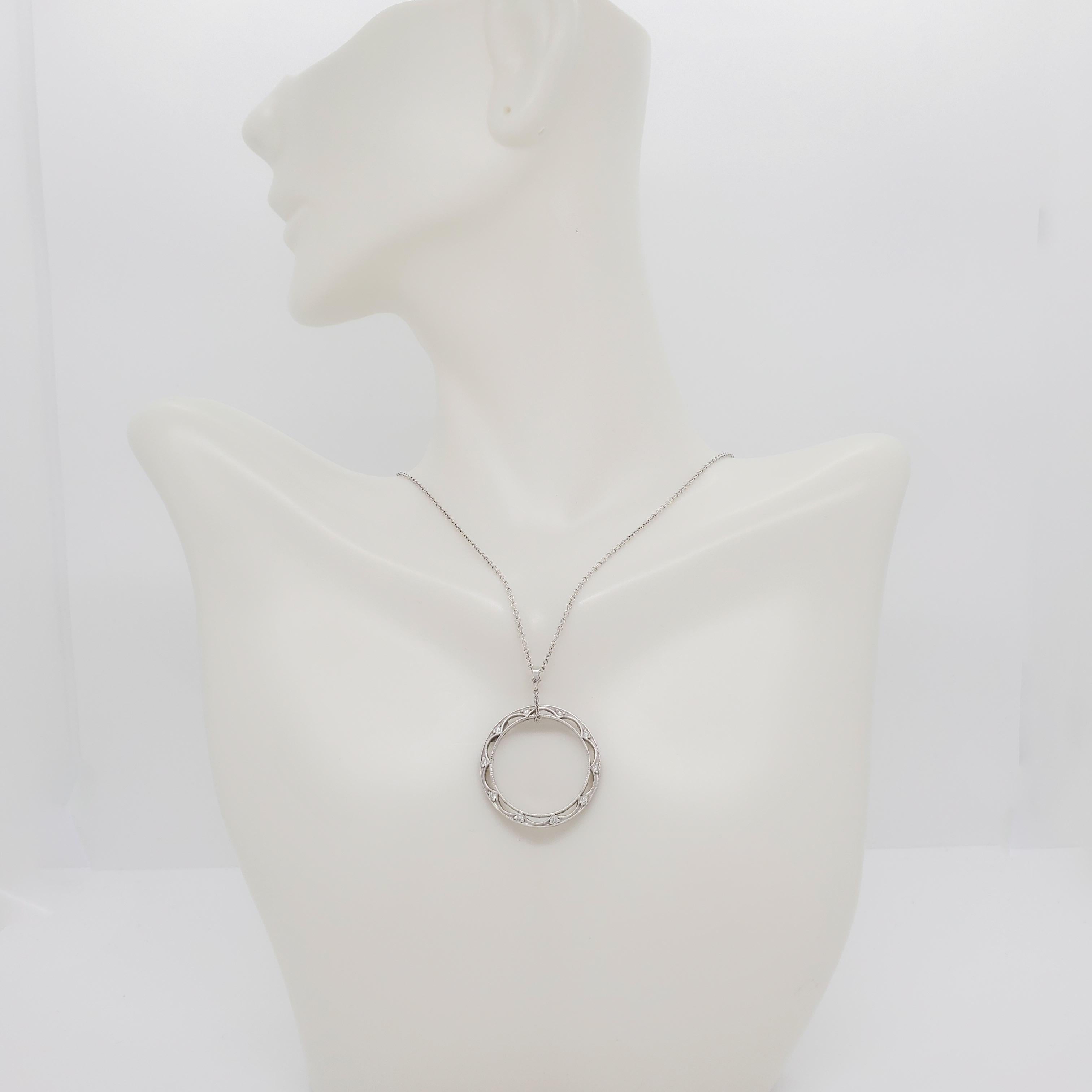 Beautiful necklace featuring 0.18 ct. good quality, white, and bright diamond rounds in a handmade 18k white gold mounting and chain.  Length is 18