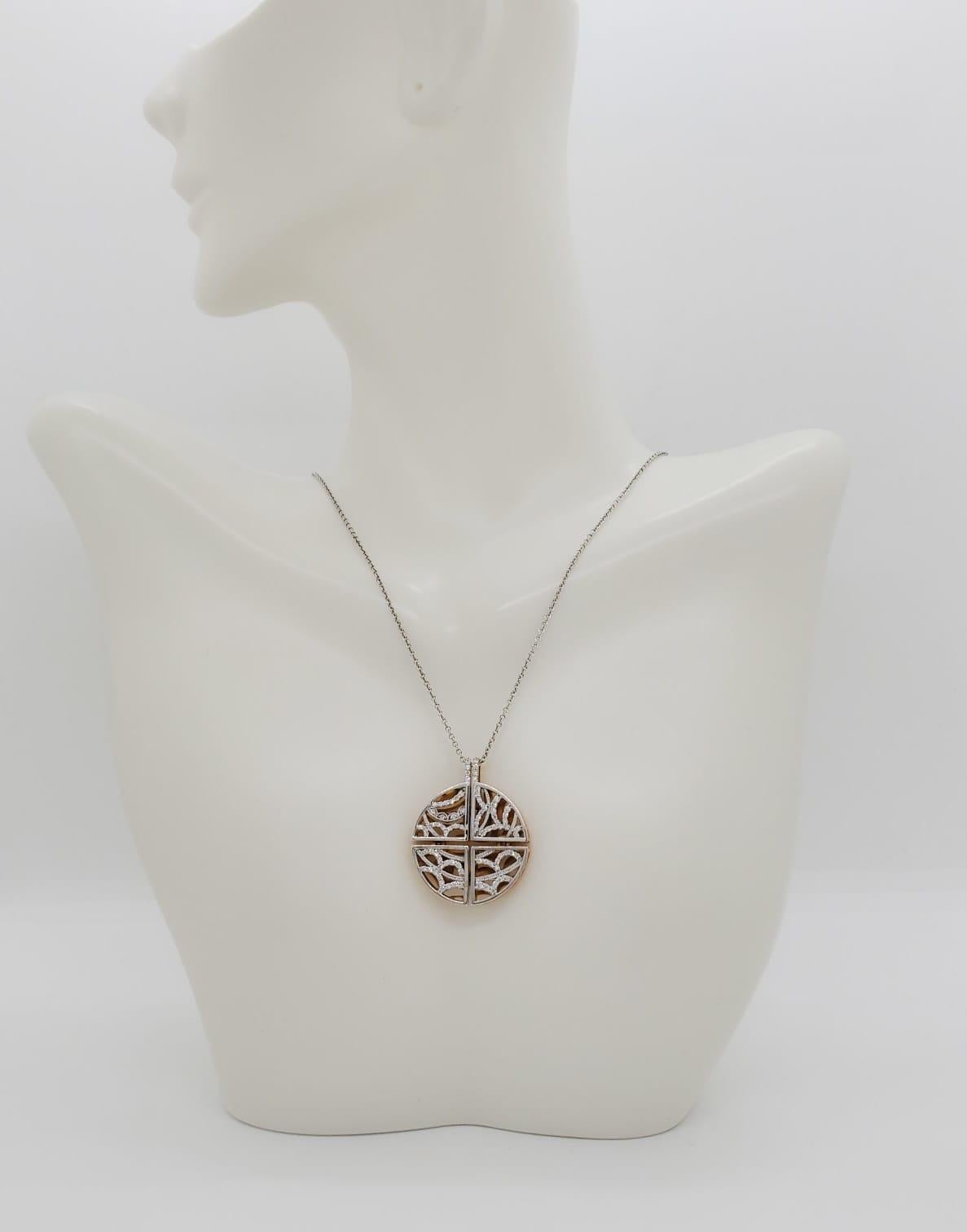 Beautiful Tacori pendant necklace with 0.38 ct. good quality diamonds handmade in 18k yellow and white gold.  Length is 18