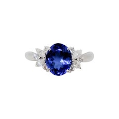 Estate Tanzanite Oval and White Diamond Ring in Platinum