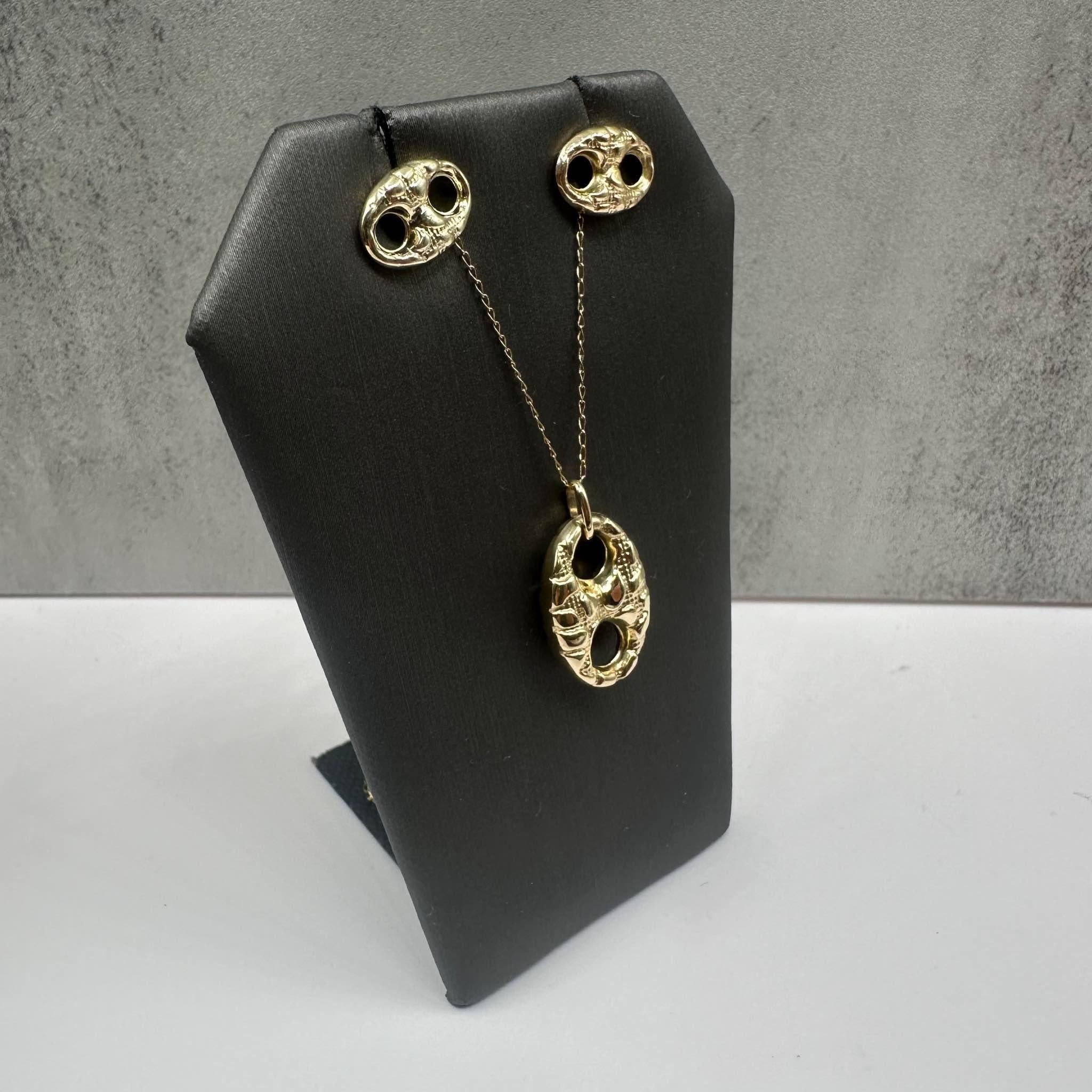 This elegant Estate Textured Puff Pendant and Earrings Set in 14kt yellow gold features a unique textured design, adding a modern touch to any outfit. The 20-inch necklace comes with a secure spring ring clasp, and the earrings have push-back