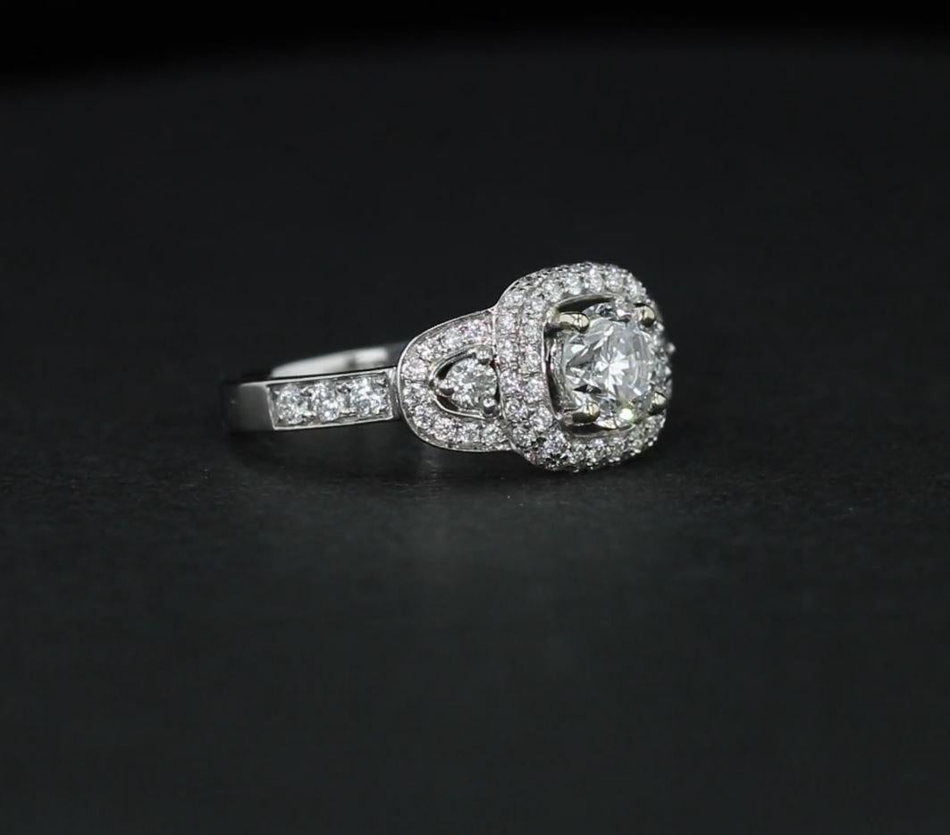 Estate Three-Stone Diamond Engagement Ring with Diamond Halos In Good Condition In NEW ORLEANS, LA