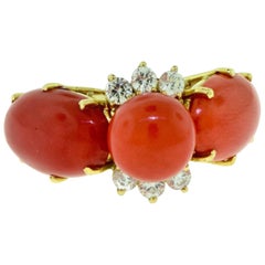 Estate Three-Stone Red Coral and Diamond Ring in 18 Karat Yellow Gold