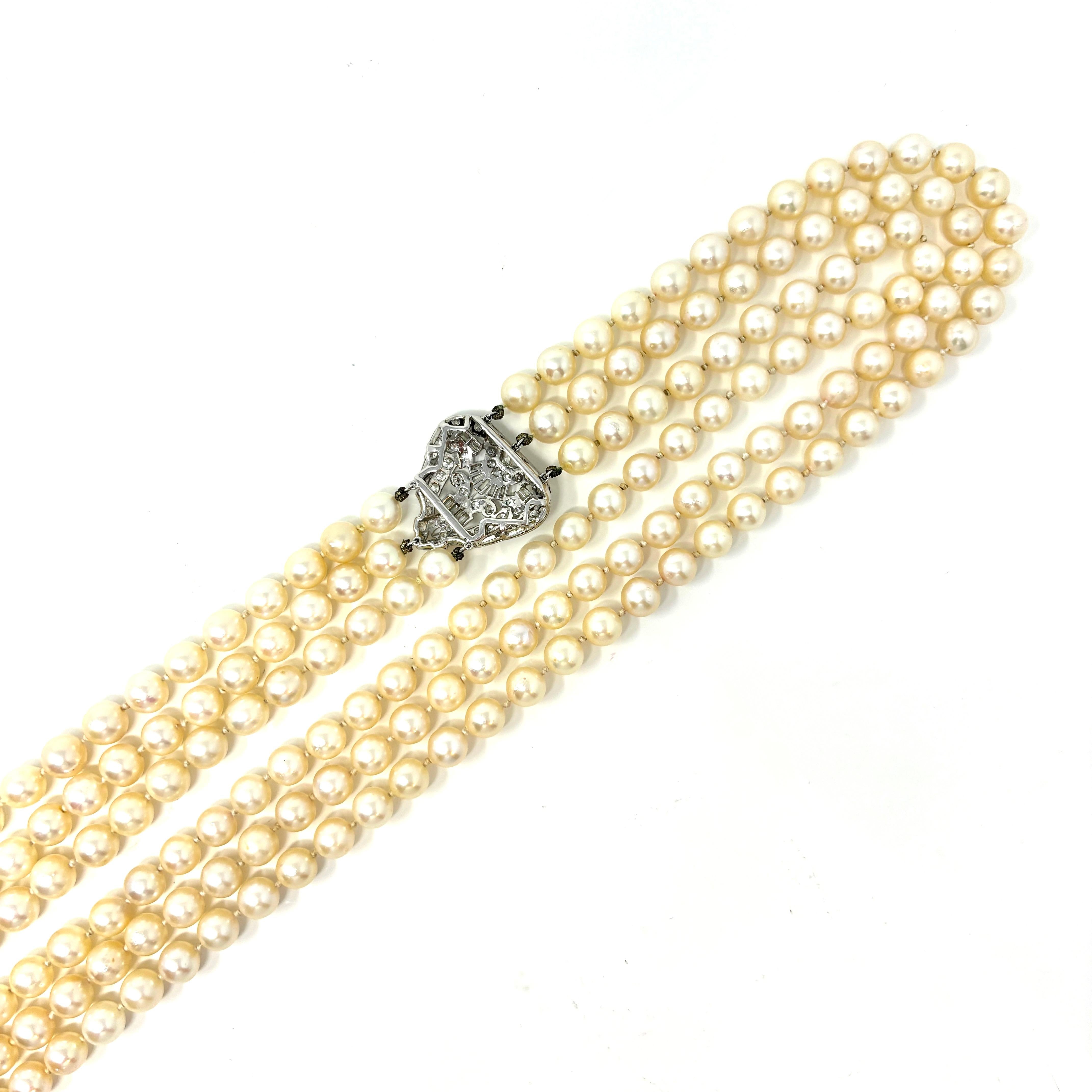 Estate Three Strand Pearl Necklace with a Platinum and Diamond Centerpiece In Good Condition In New Orleans, LA
