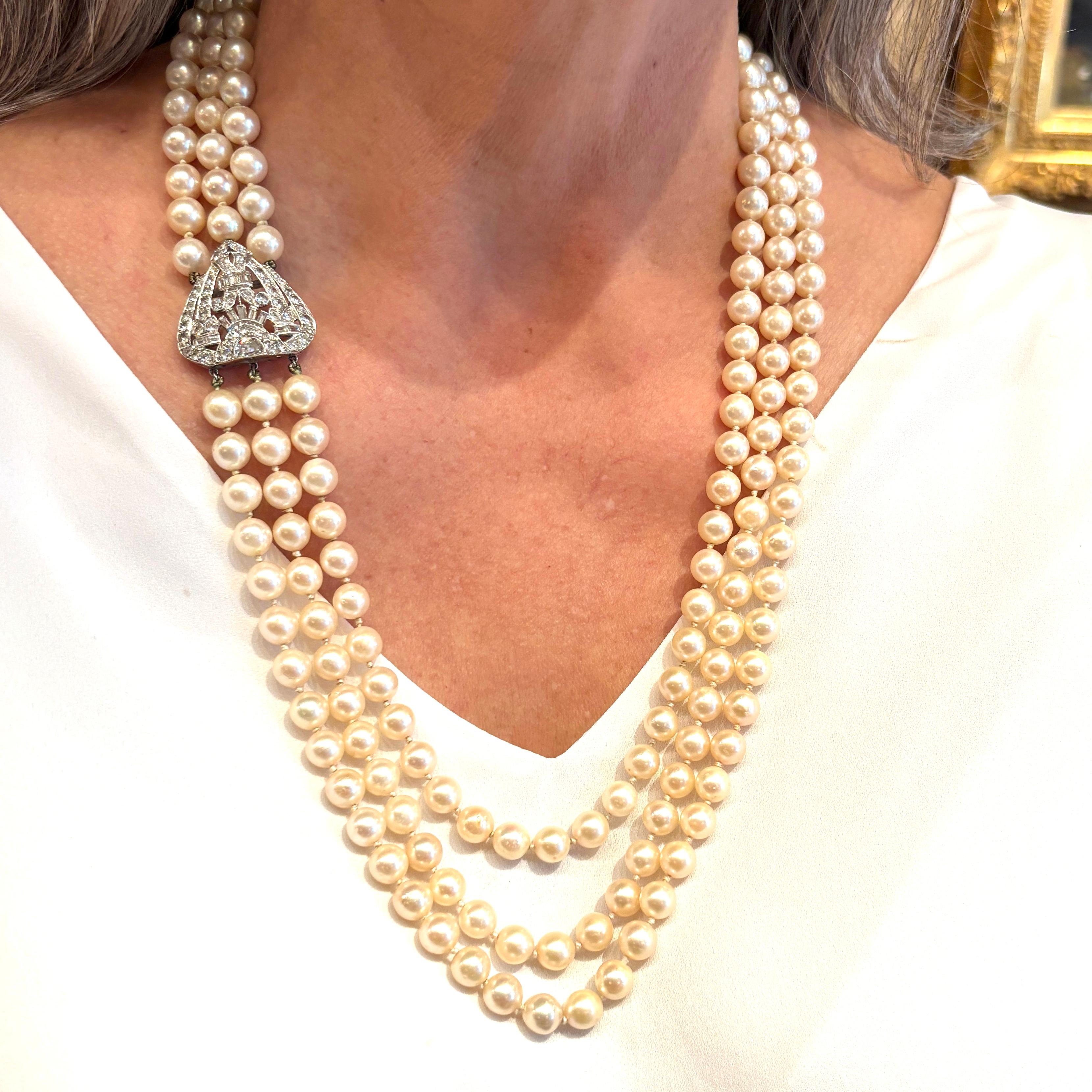 Estate Three Strand Pearl Necklace with a Platinum and Diamond Centerpiece 2