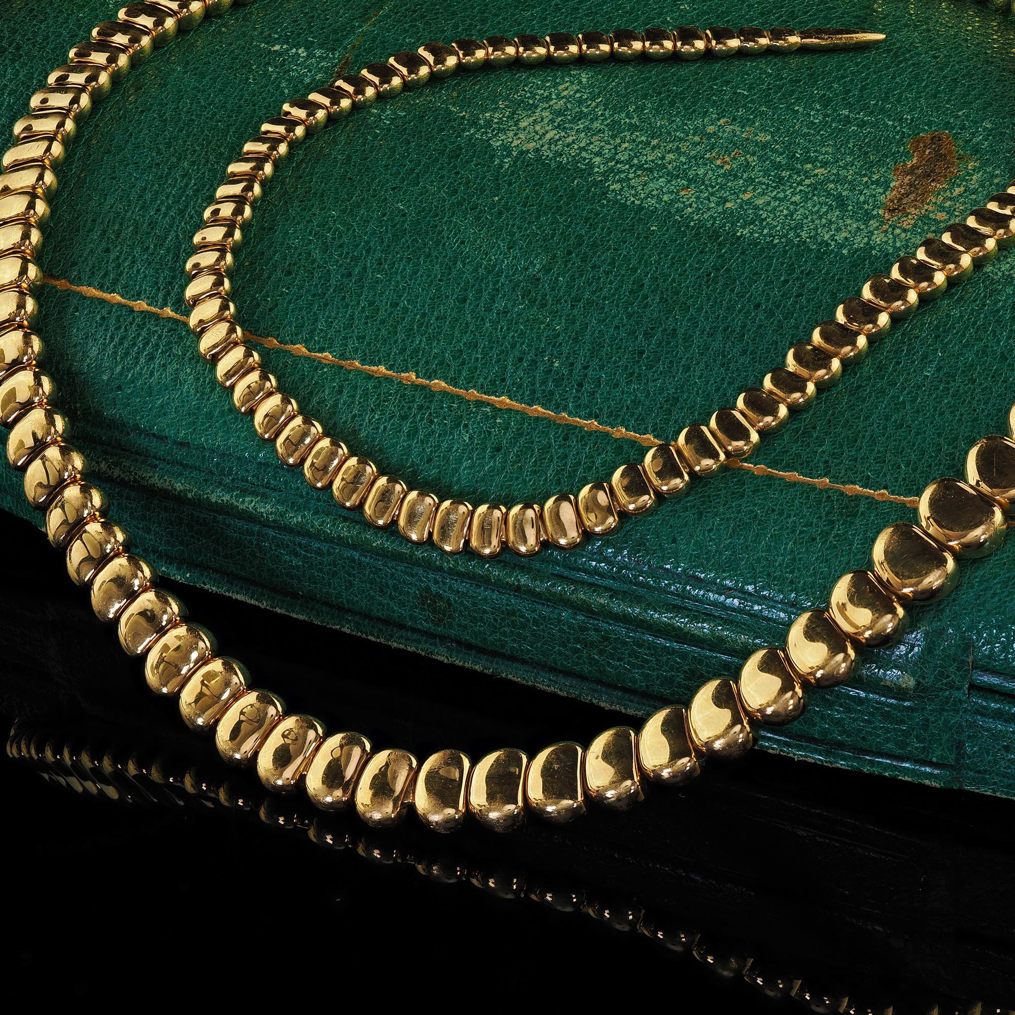 Estate Tiffany and Co Elsa Peretti 18K Yellow Gold Snake Necklace - 27.5 inches In Good Condition For Sale In Great Neck, NY