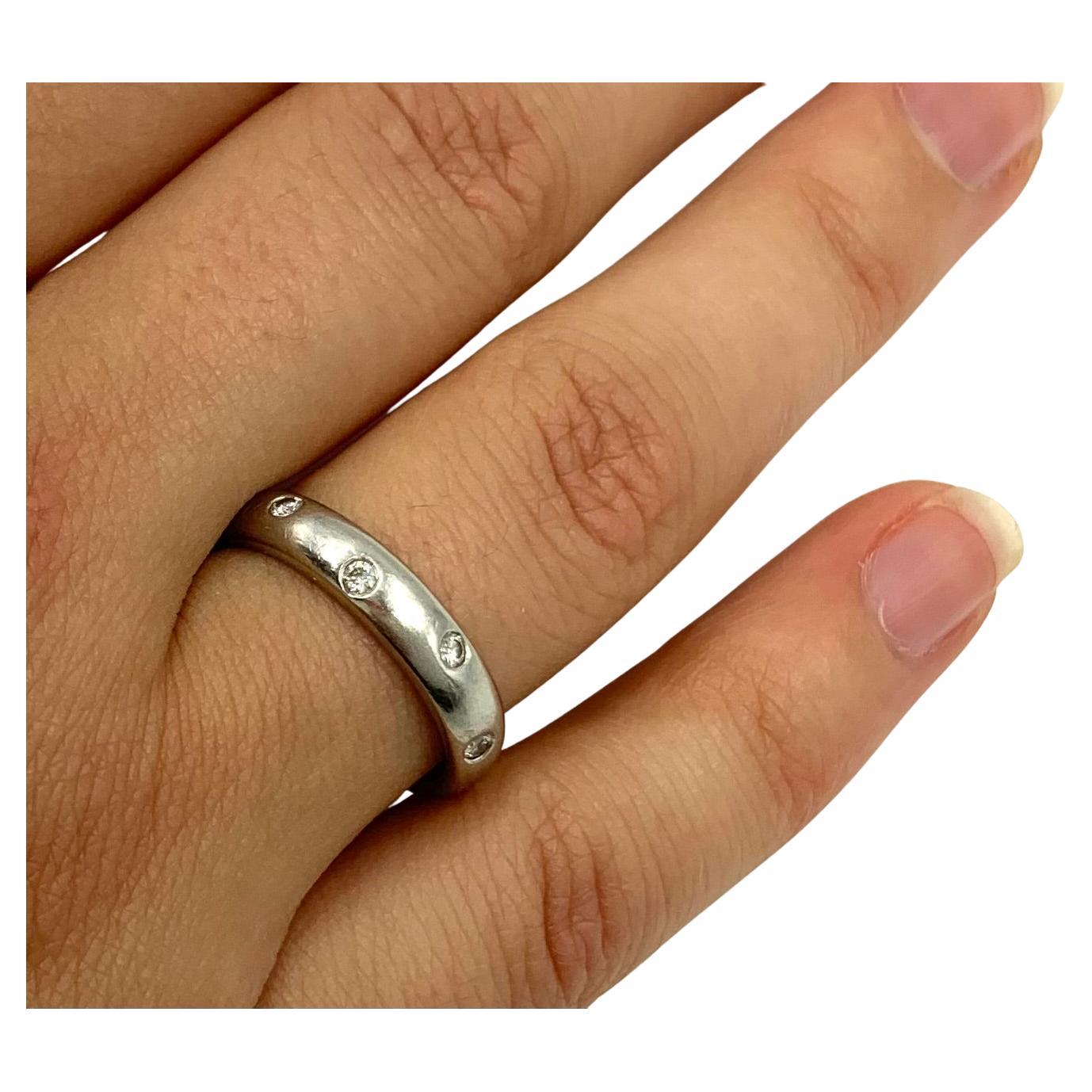 Estate Tiffany
Co. 10 Diamond Platinum Etoile Band Ring, 6.75 US