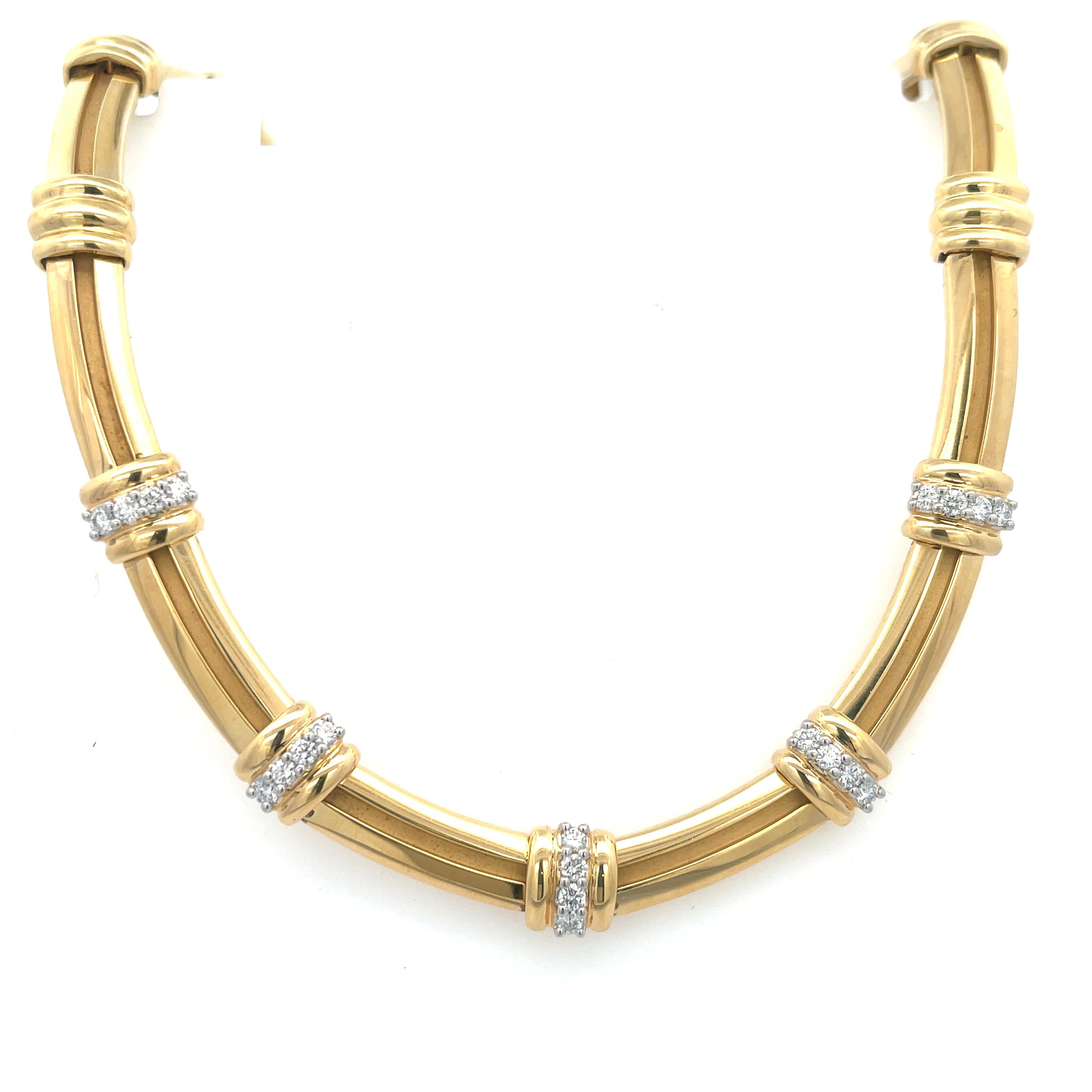 Estate Tiffany & Co. Diamond Station Necklace in 18K Yellow Gold. The necklace features five stations of brilliant round diamonds with 1.90ctw. The necklace is 15.25