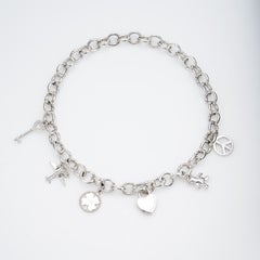 Estate Tiffany & Co. 6 Charm Necklace Sterling Silver Heart Airplane Bear Clover