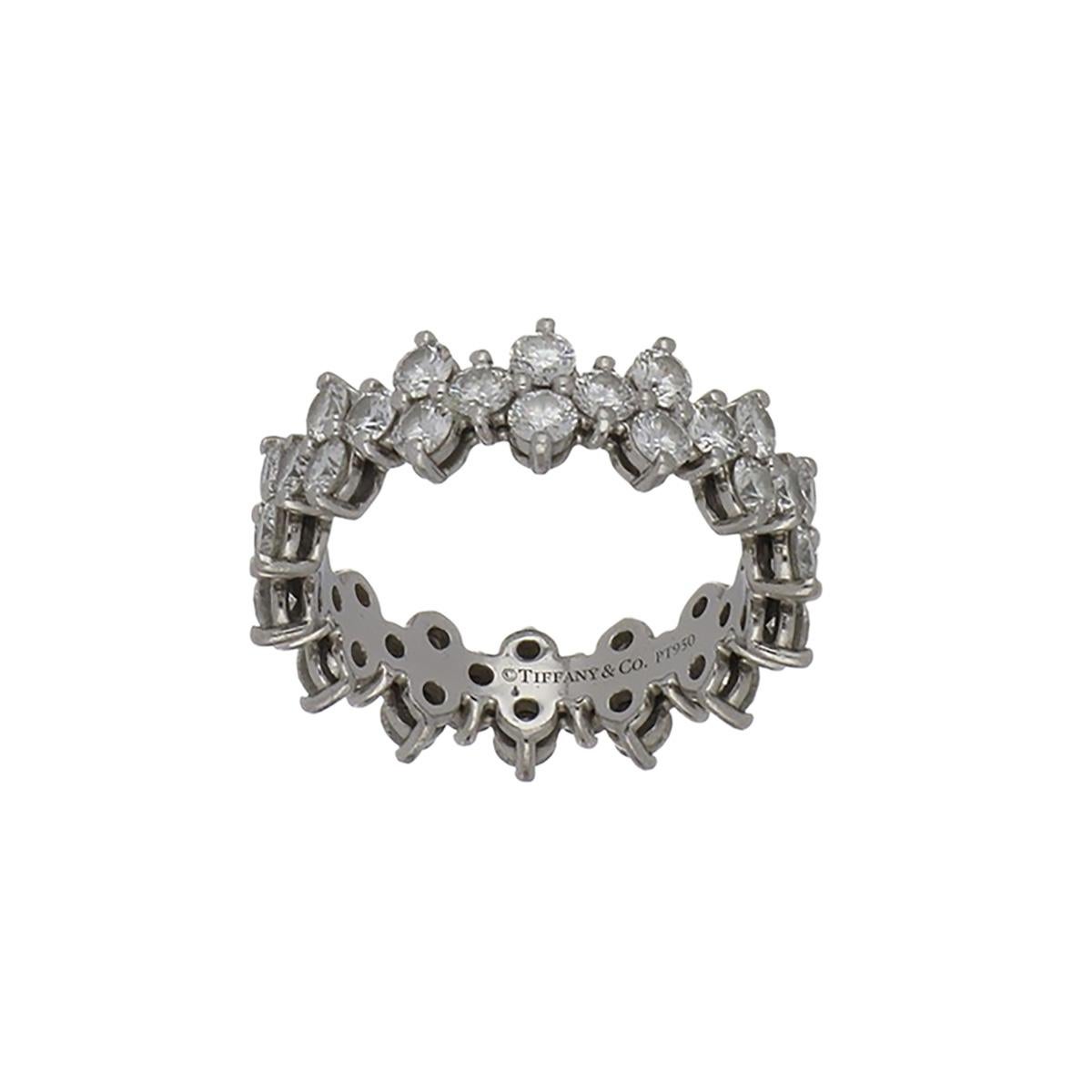 An estate Tiffany & Co. Aria round diamond eternity band in platinum. There are 40 round brilliant-cut diamonds that total 2.80 carats, F-G color and VVS1-VS2.  Circa 2010.  Size 5 3/4; not sizeable.